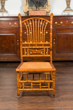 English 1890s Bamboo Slipper Chair with Fan Back, Rattan Seat and Casters