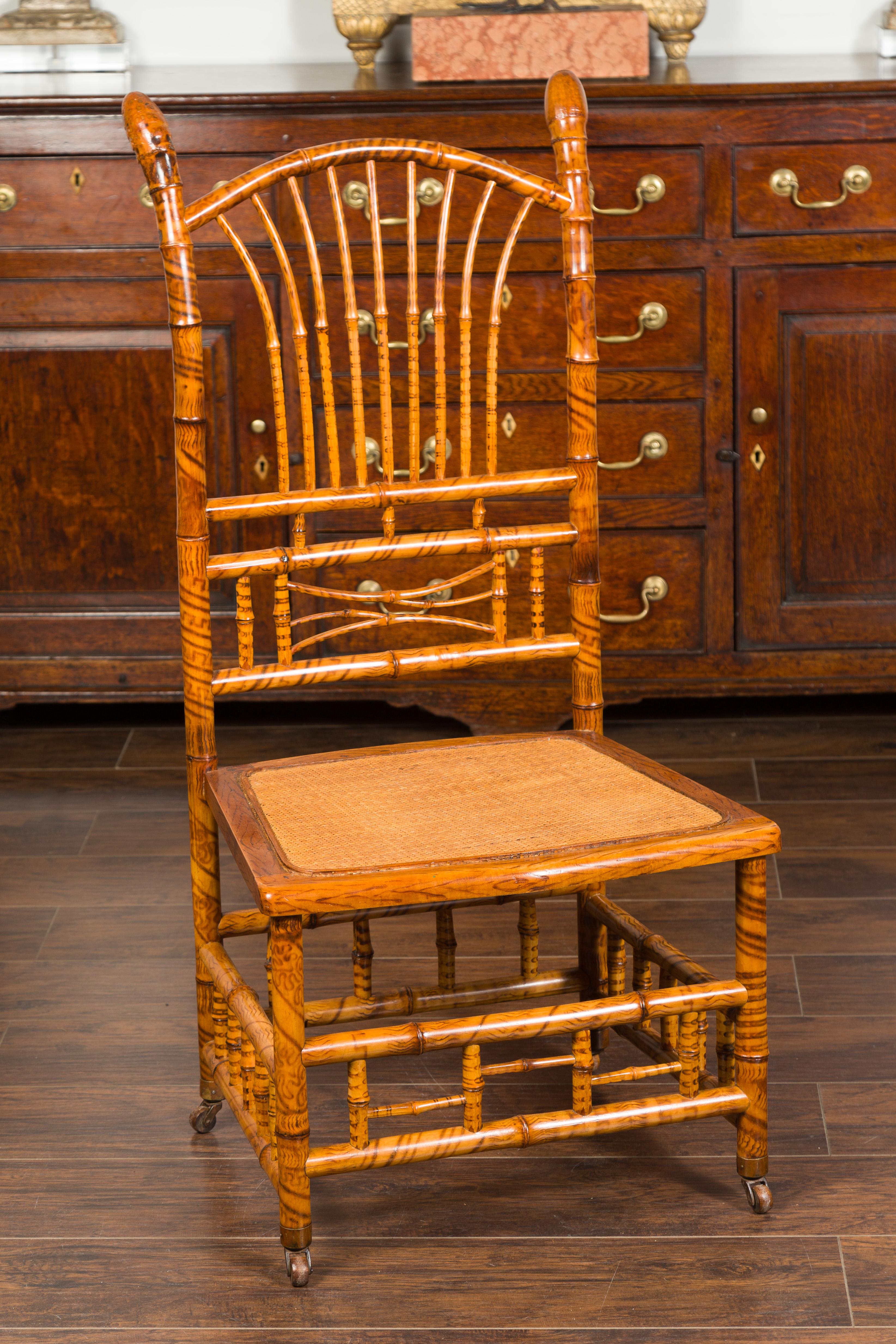 English 1890s Bamboo Slipper Chair with Fan Back, Rattan Seat and Casters For Sale 1