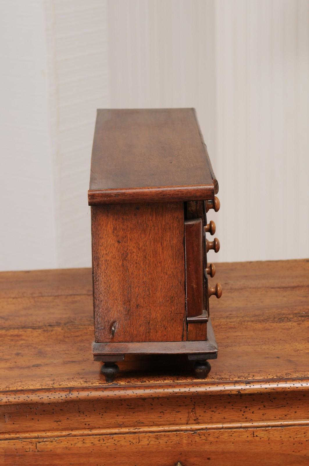English 1890s Miniature Chest with Seven Drawers, Semi Columns and Turnip Feet 5