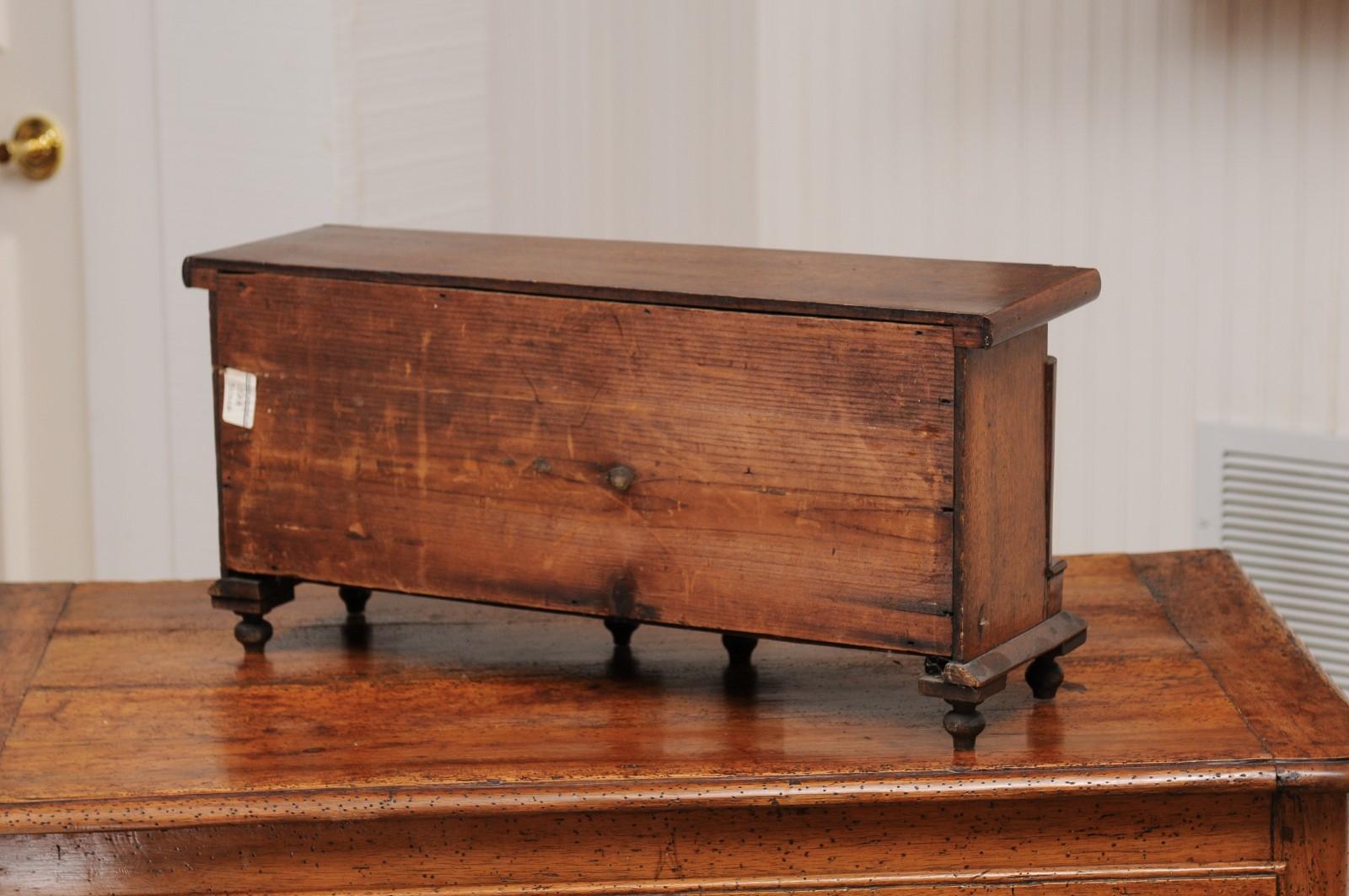 English 1890s Miniature Chest with Seven Drawers, Semi Columns and Turnip Feet 6