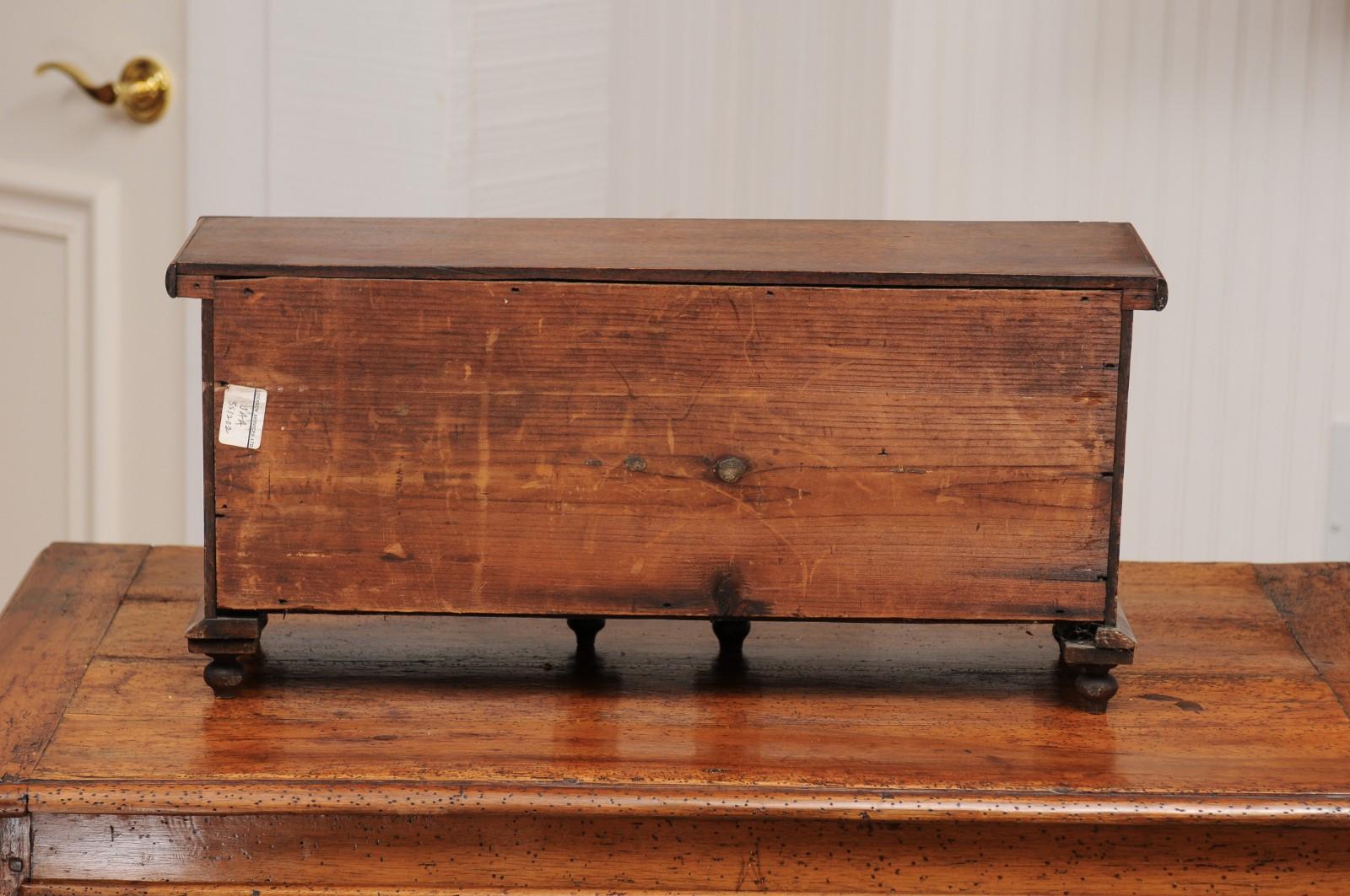 English 1890s Miniature Chest with Seven Drawers, Semi Columns and Turnip Feet 7