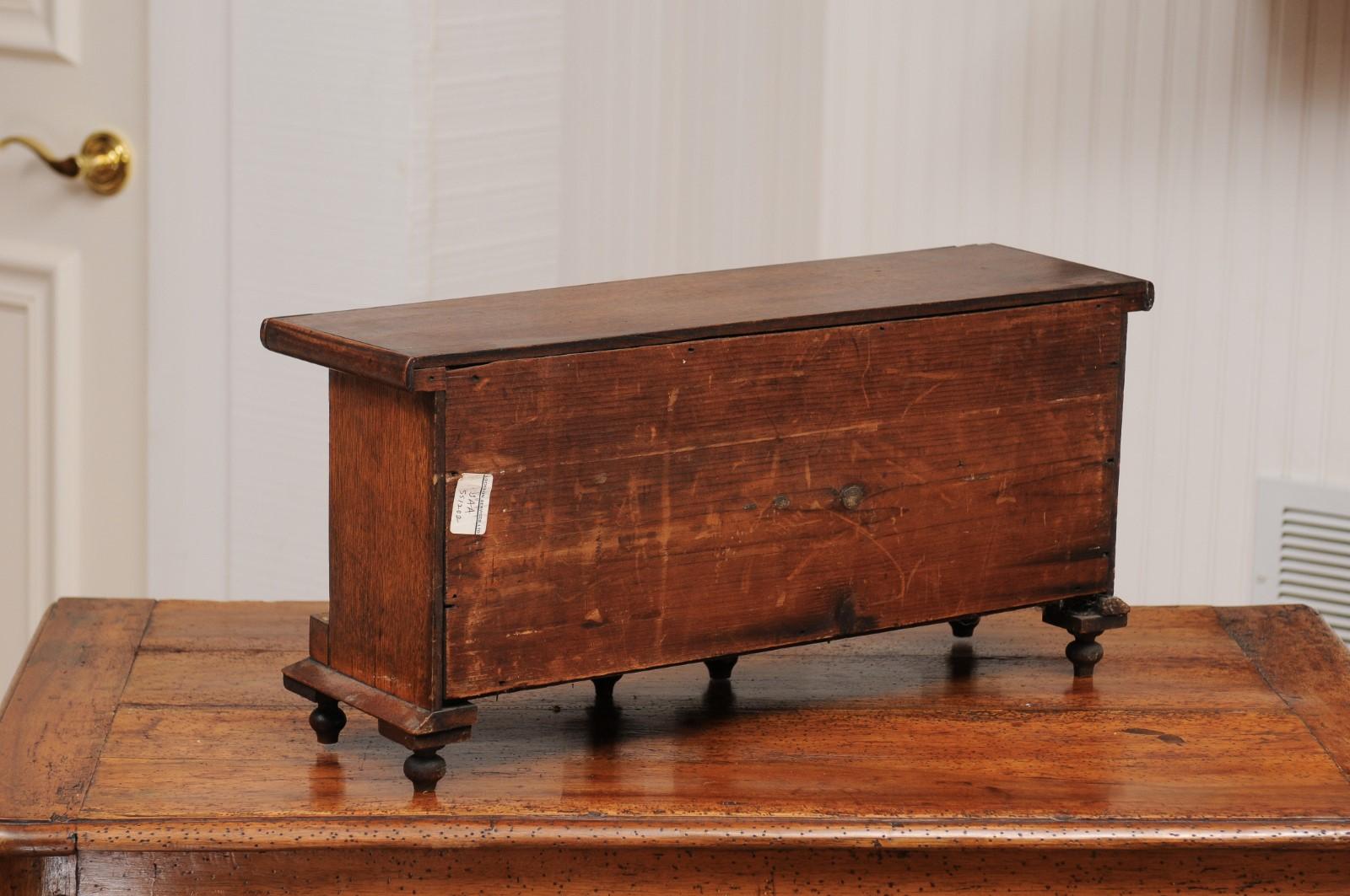 English 1890s Miniature Chest with Seven Drawers, Semi Columns and Turnip Feet 8
