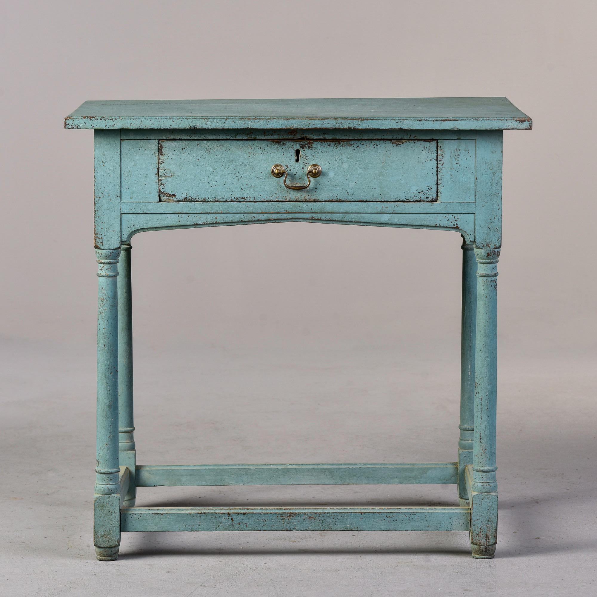 Circa 1780s small English side table with single drawer and robin’s egg blue painted finish. Drawer has locking hardware but no key found with this piece. Unknown maker.