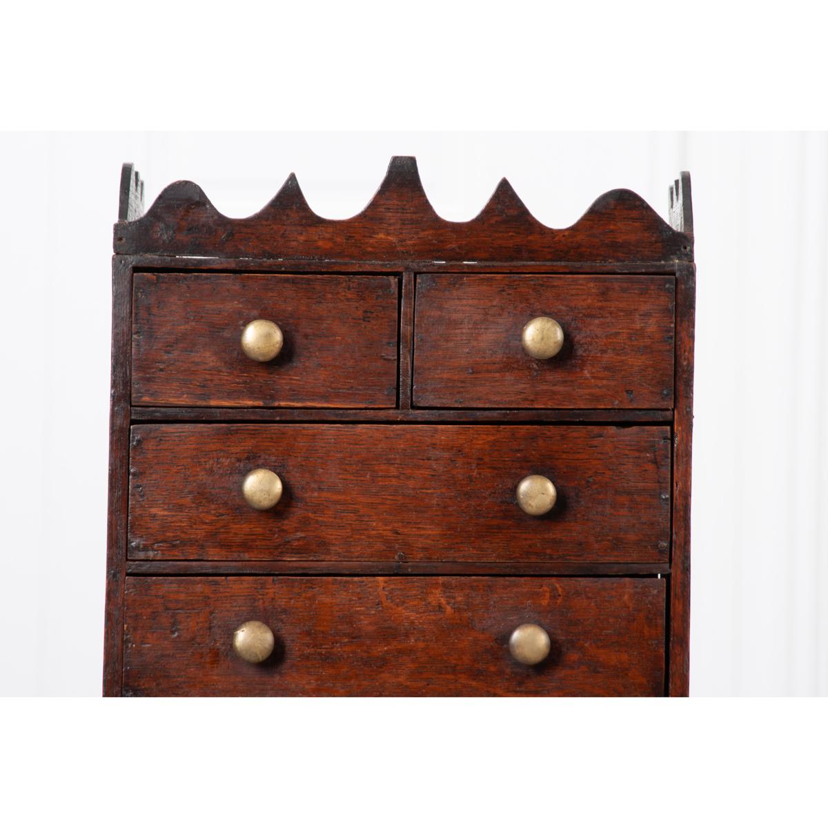 A lovely, English apprentice chest from the 18th century, circa 1780. This wonderful work is that of an apprentice that studied under a woodworker. In order to work for the woodworker, the apprentice would have to build a box, utilizing his best