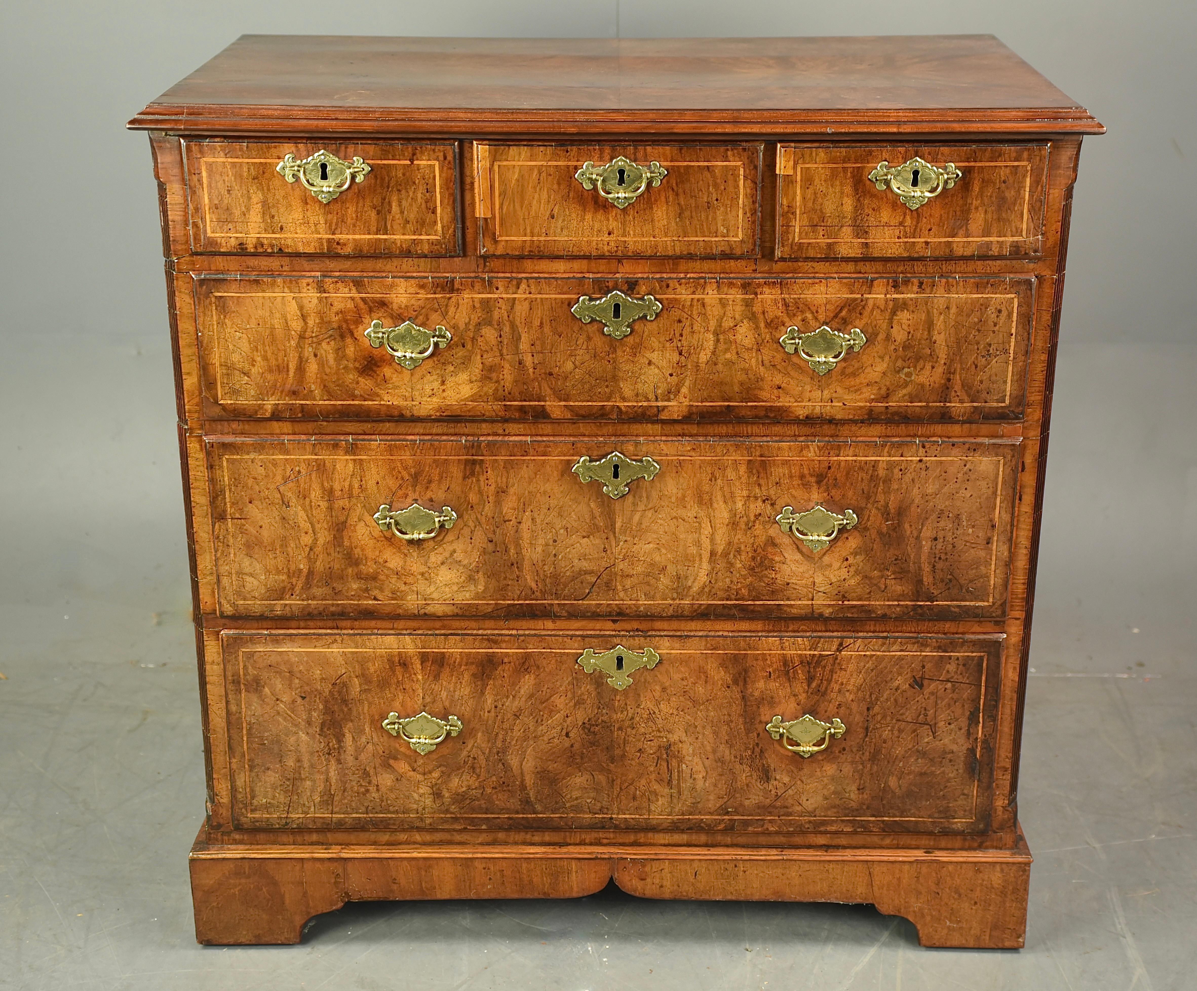 Fine quality early 18th century walnut chest of drawers circa 1730 .
The chest consists of three small drawers over 3 full width drawers that are all oak lined with engraved plate handles , All drawers are solid and slide nice and smooth as they
