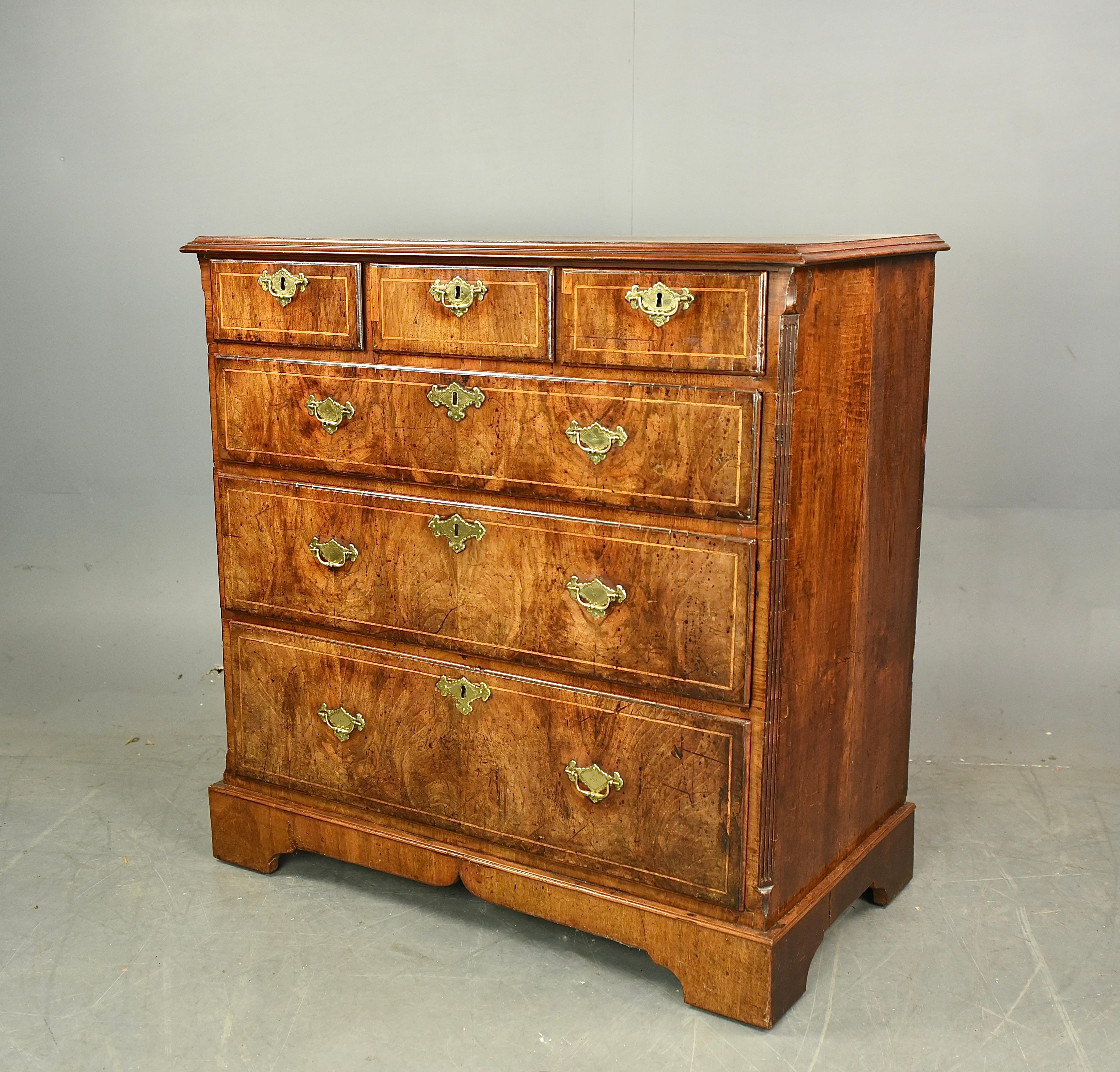Fine quality early 18th century walnut chest of drawers circa 1730 .
The chest consists of three small drawers over 3 full width drawers that are all oak lined with engraved plate handles , All drawers are solid and slide nice and smooth as they