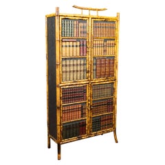English 1900s Bamboo Cabinet with Faux Books Façade and Splaying Legs
