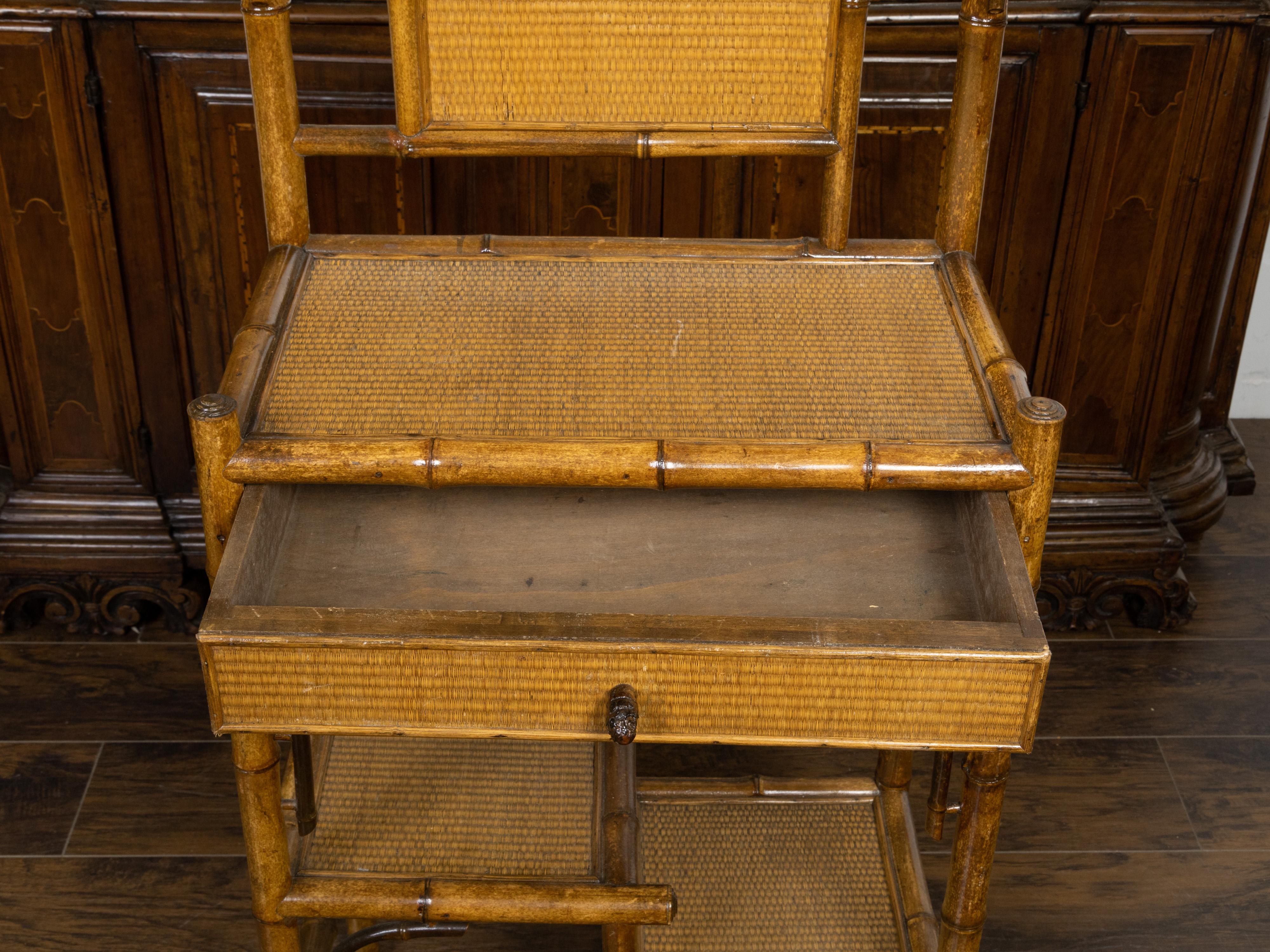 English 1900s Bamboo Freestanding Shelf with Rattan Accents and Single Drawer For Sale 3