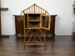 English 1900s Freestanding Bamboo Corner Display Shelf with Glass Door