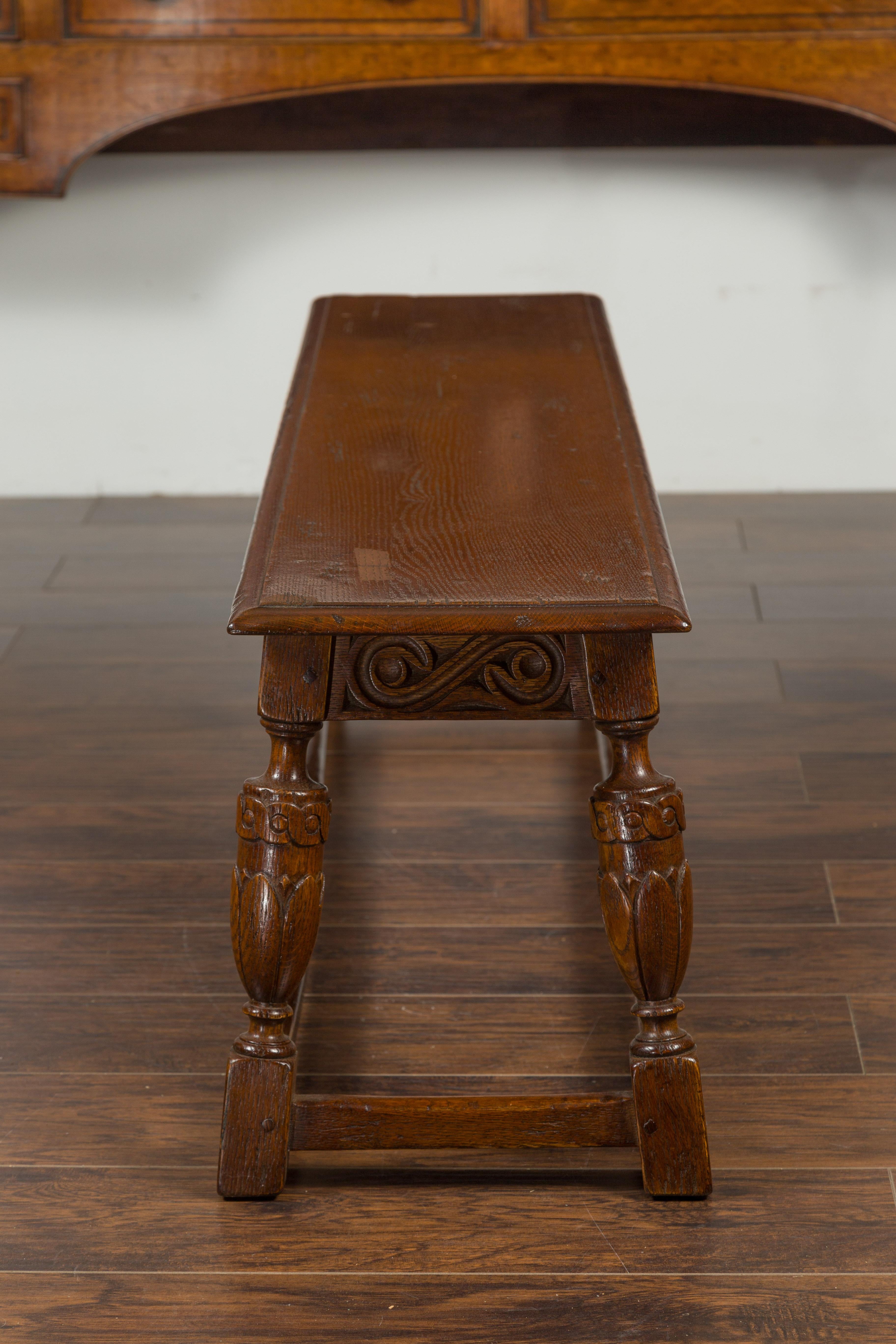 English 1900s Oak Bench with Carved Apron, Baluster Legs and Guilloche Motifs 4