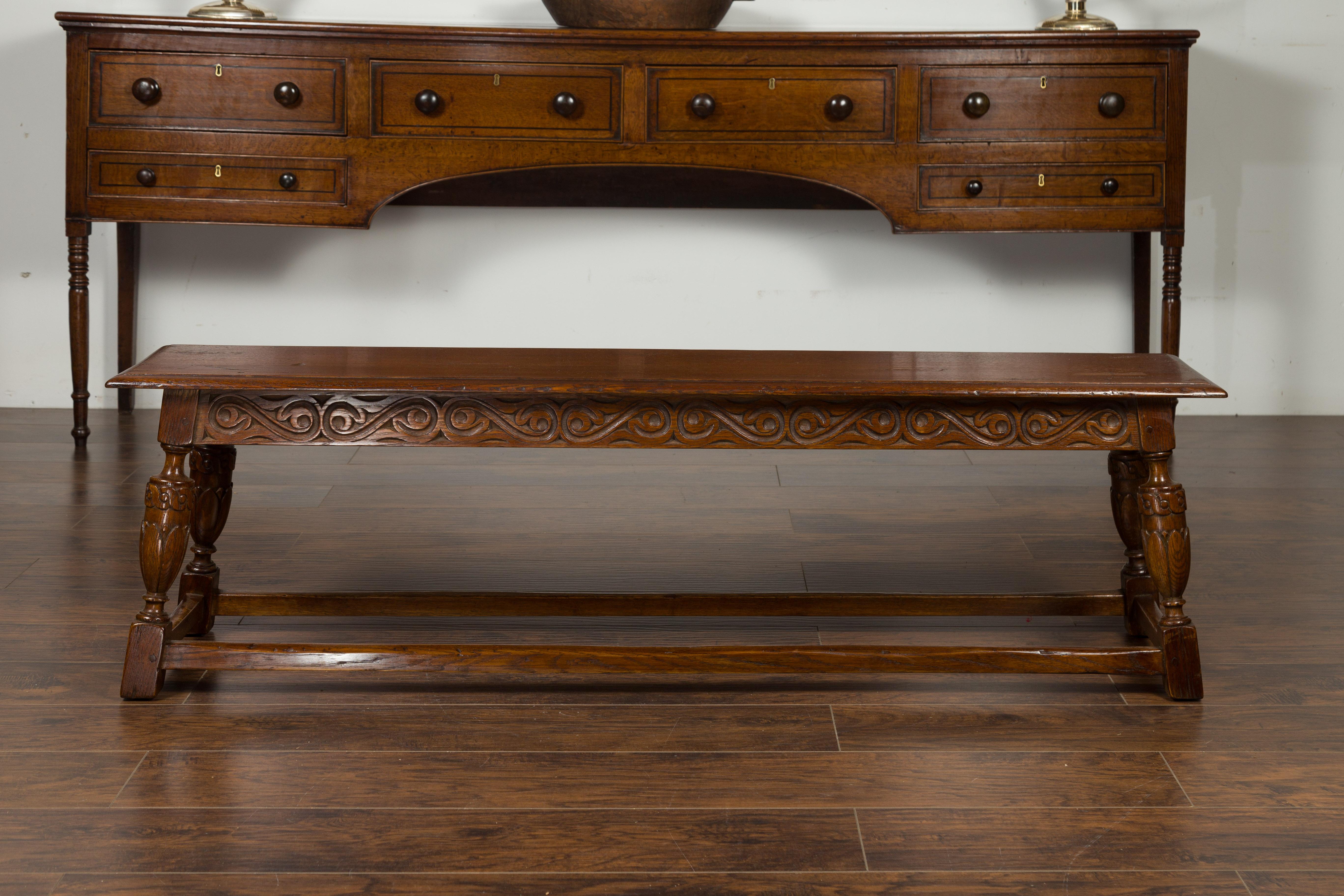 English 1900s Oak Bench with Carved Apron, Baluster Legs and Guilloche Motifs 5