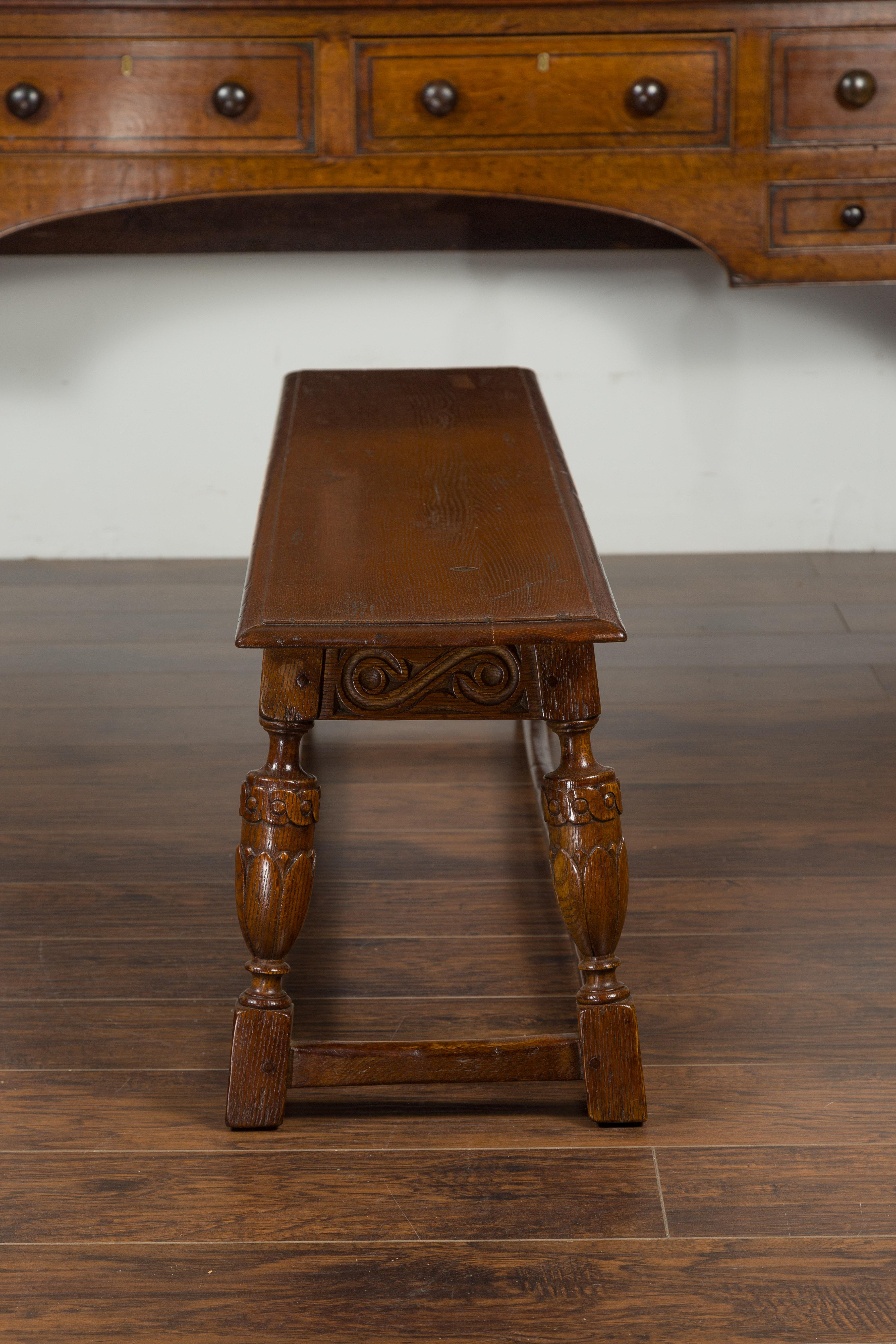 English 1900s Oak Bench with Carved Apron, Baluster Legs and Guilloche Motifs 6