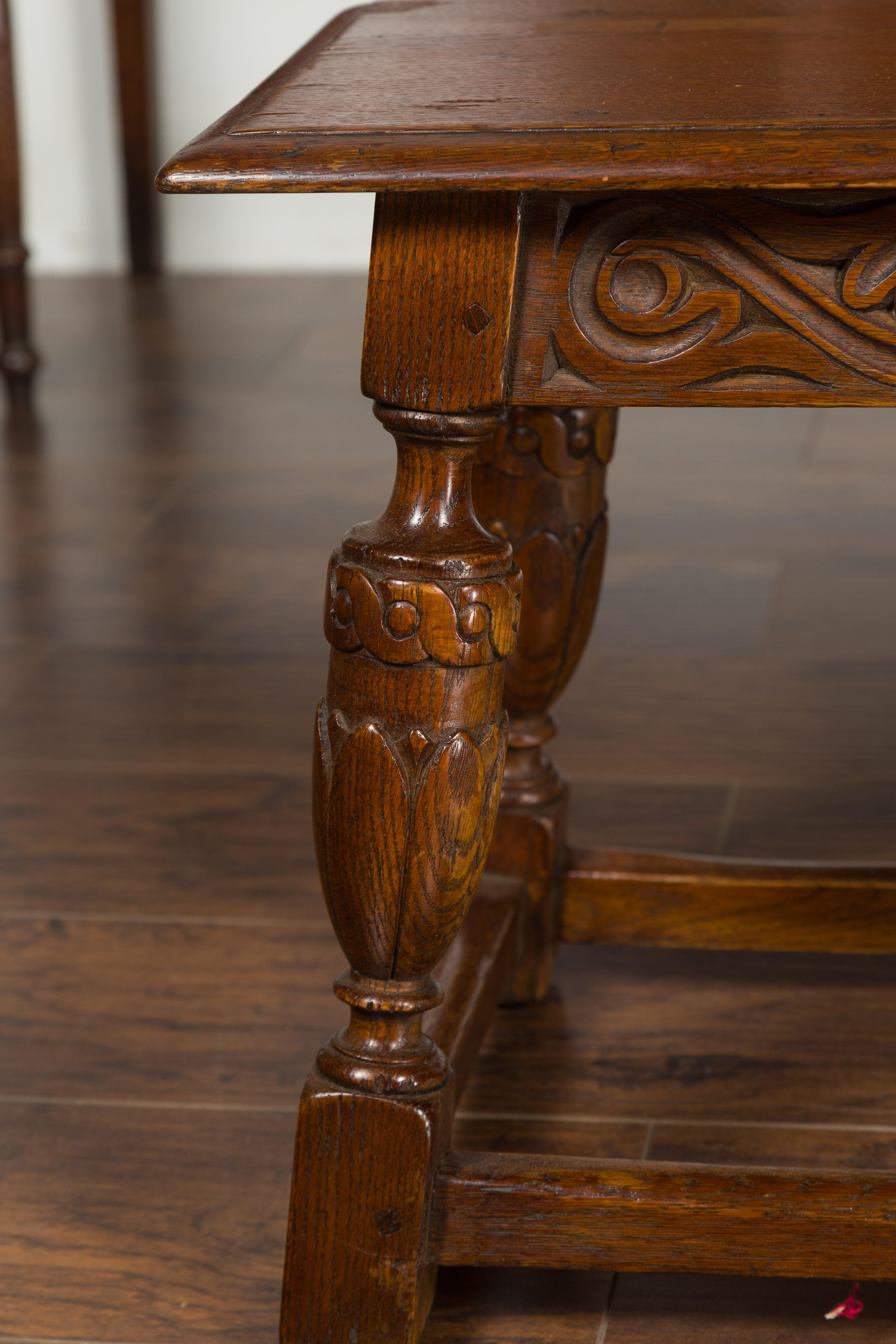 20th Century English 1900s Oak Bench with Carved Apron, Baluster Legs and Guilloche Motifs