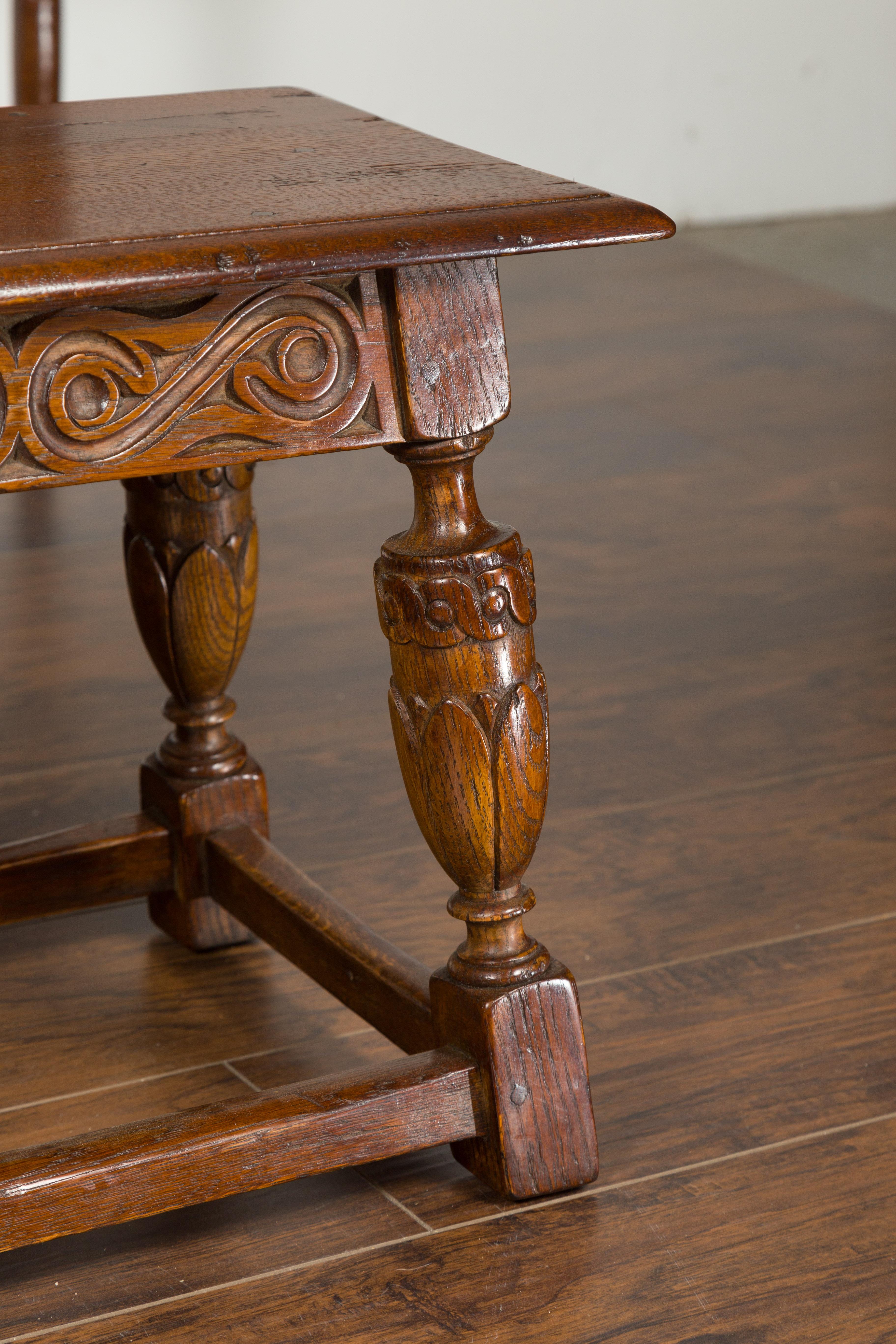 English 1900s Oak Bench with Carved Apron, Baluster Legs and Guilloche Motifs 1