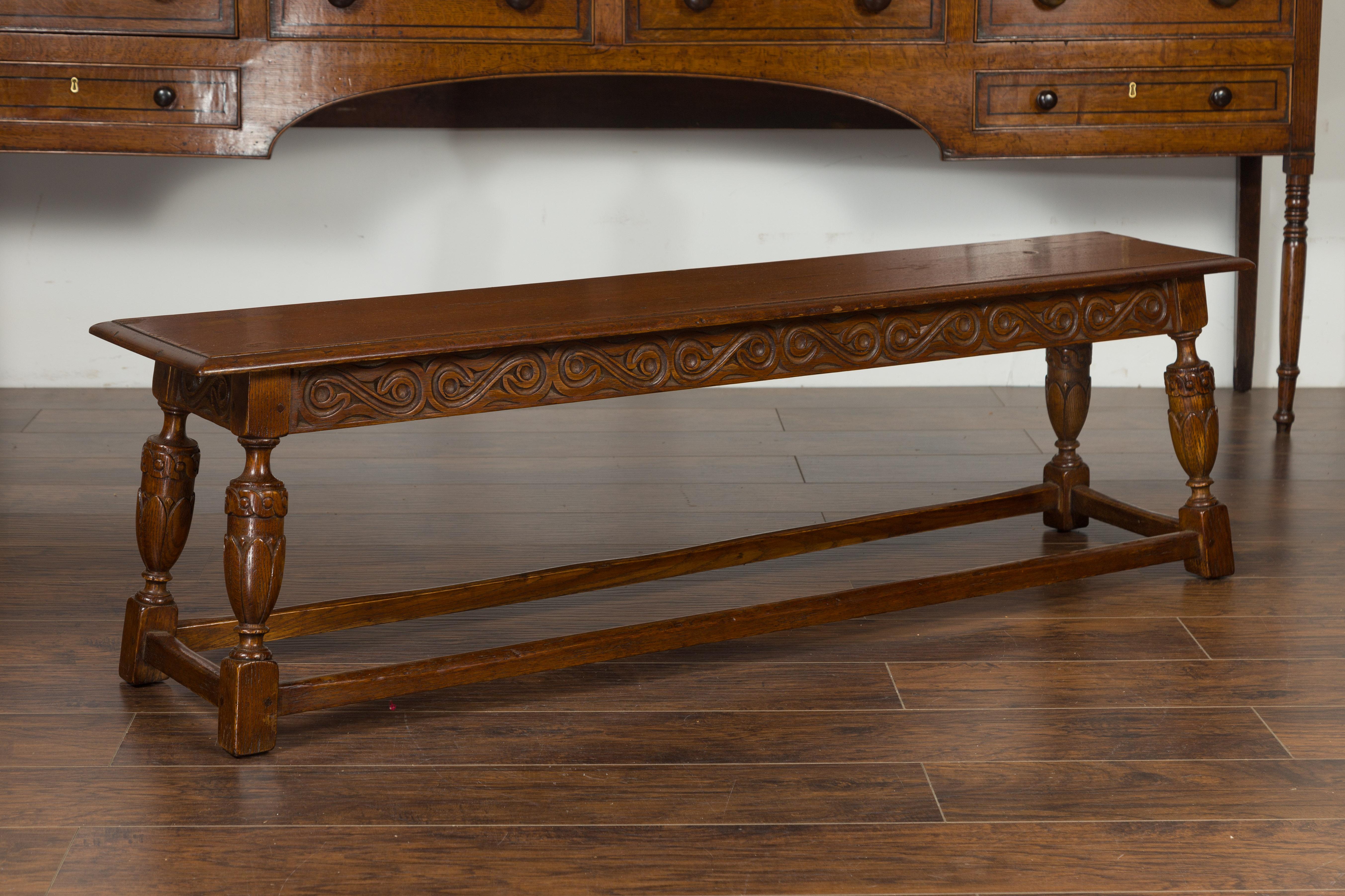 English 1900s Oak Bench with Carved Apron, Baluster Legs and Guilloche Motifs 2
