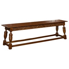 English 1900s Oak Bench with Carved Apron, Baluster Legs and Guilloche Motifs