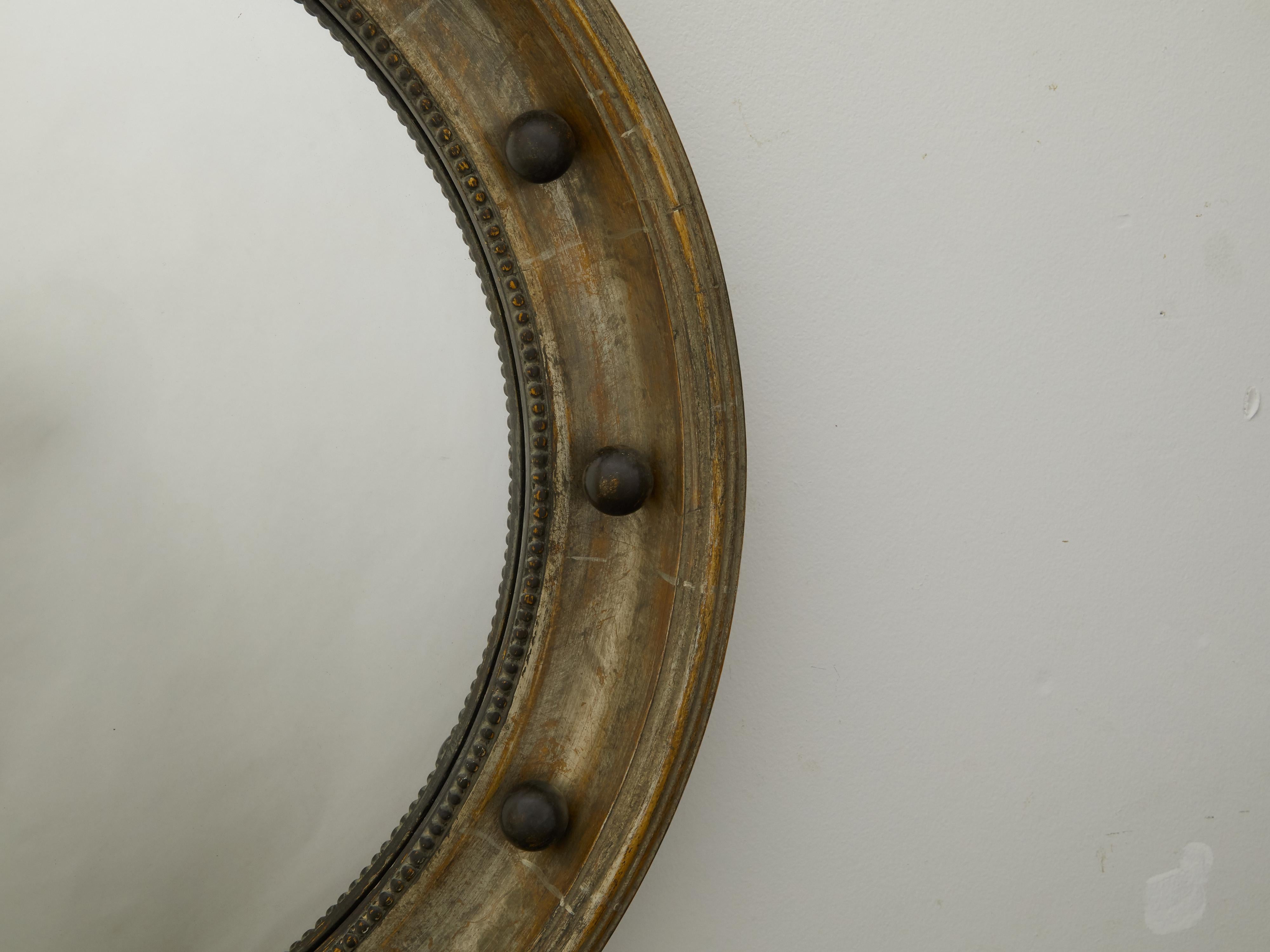 Gilt English 1900s Silver Leaf Beaded Convex Bullseye Mirror with Ebonized Accents For Sale