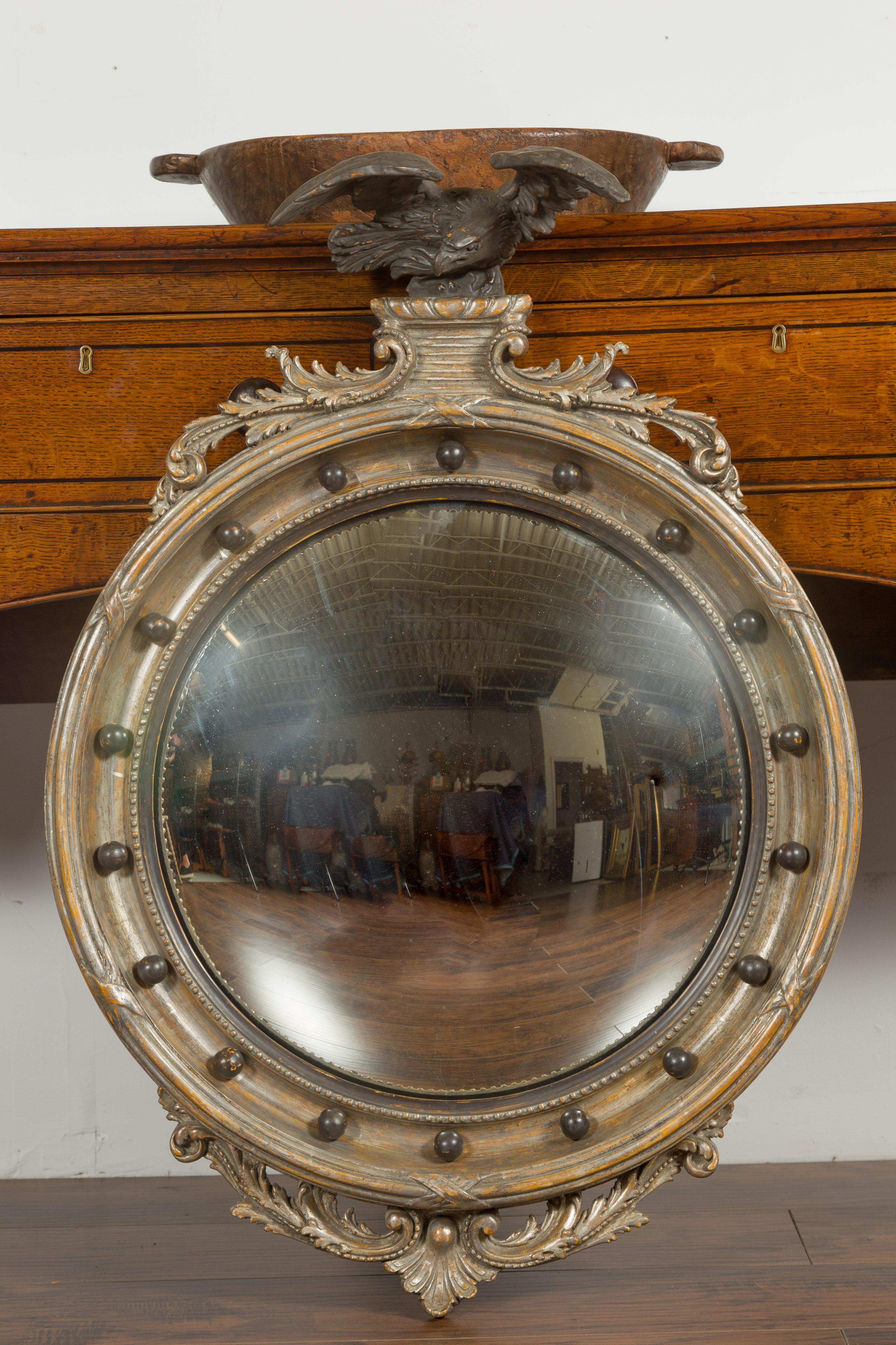 Carved English 1900s Silver Leaf Convex Girandole Bullseye Mirror with Eagle Motif For Sale