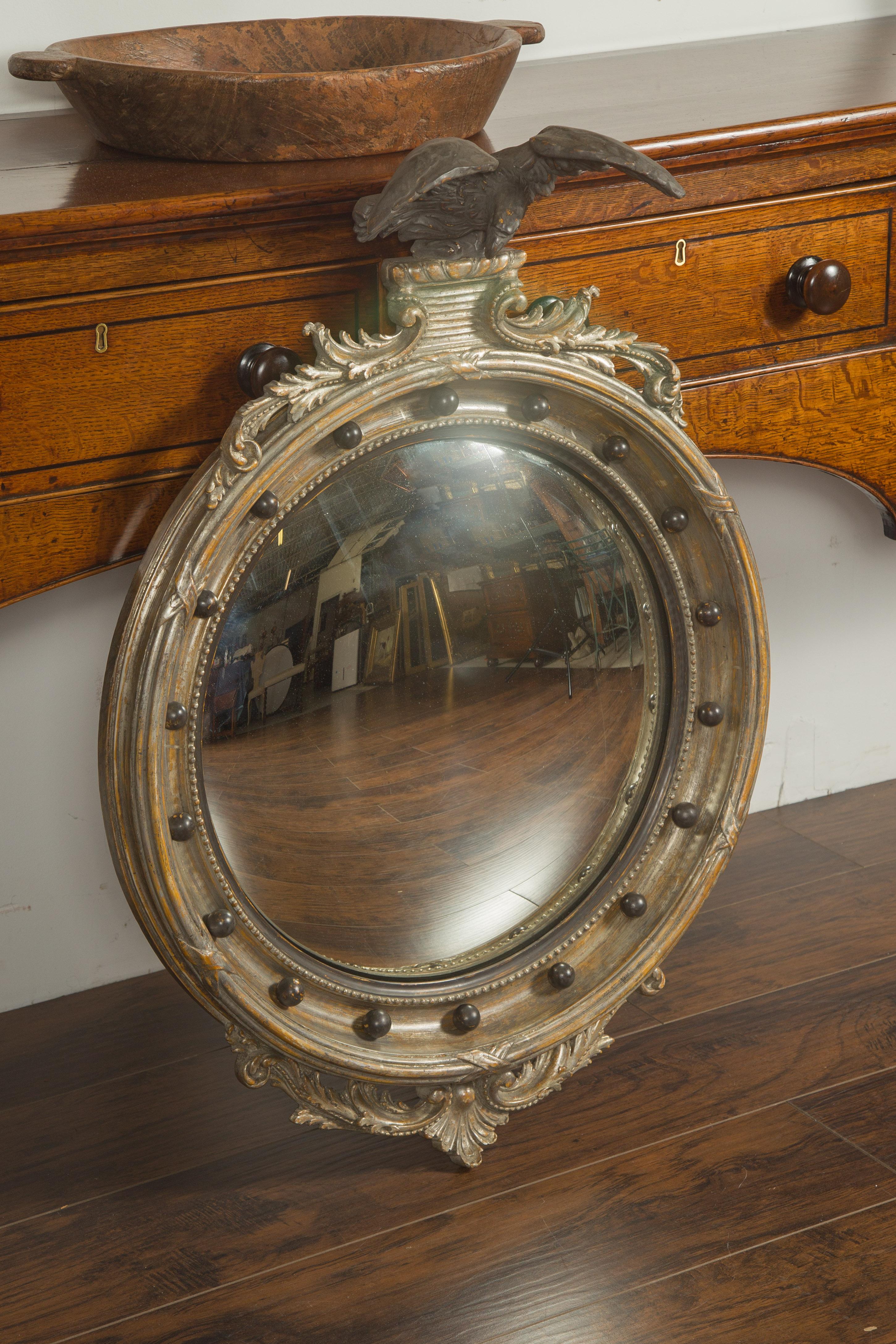 English 1900s Silver Leaf Convex Girandole Bullseye Mirror with Eagle Motif In Good Condition For Sale In Atlanta, GA