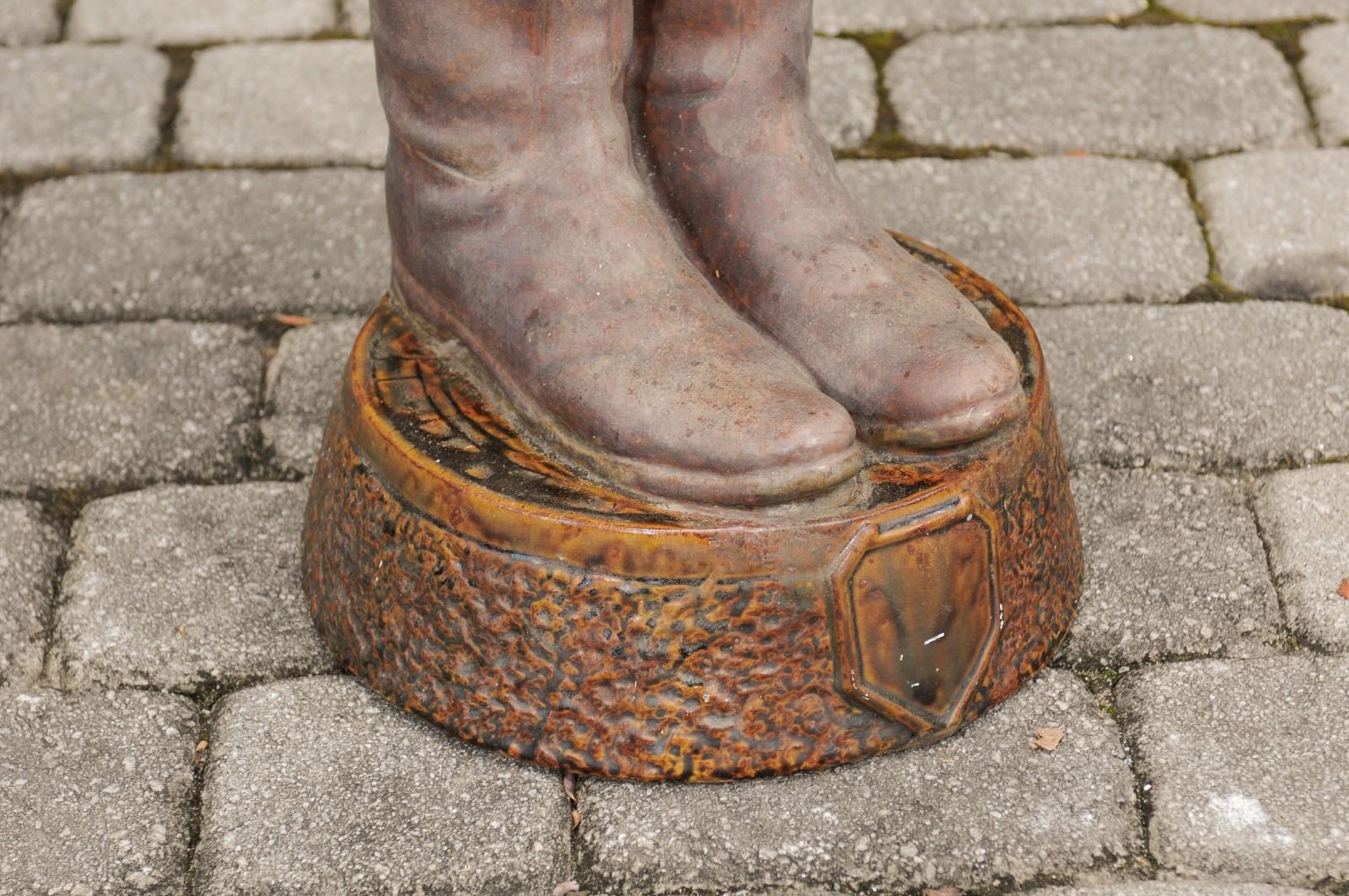 Painted Terracotta Umbrella Stand Depicting a Pair of Brown Riding Boots on Base