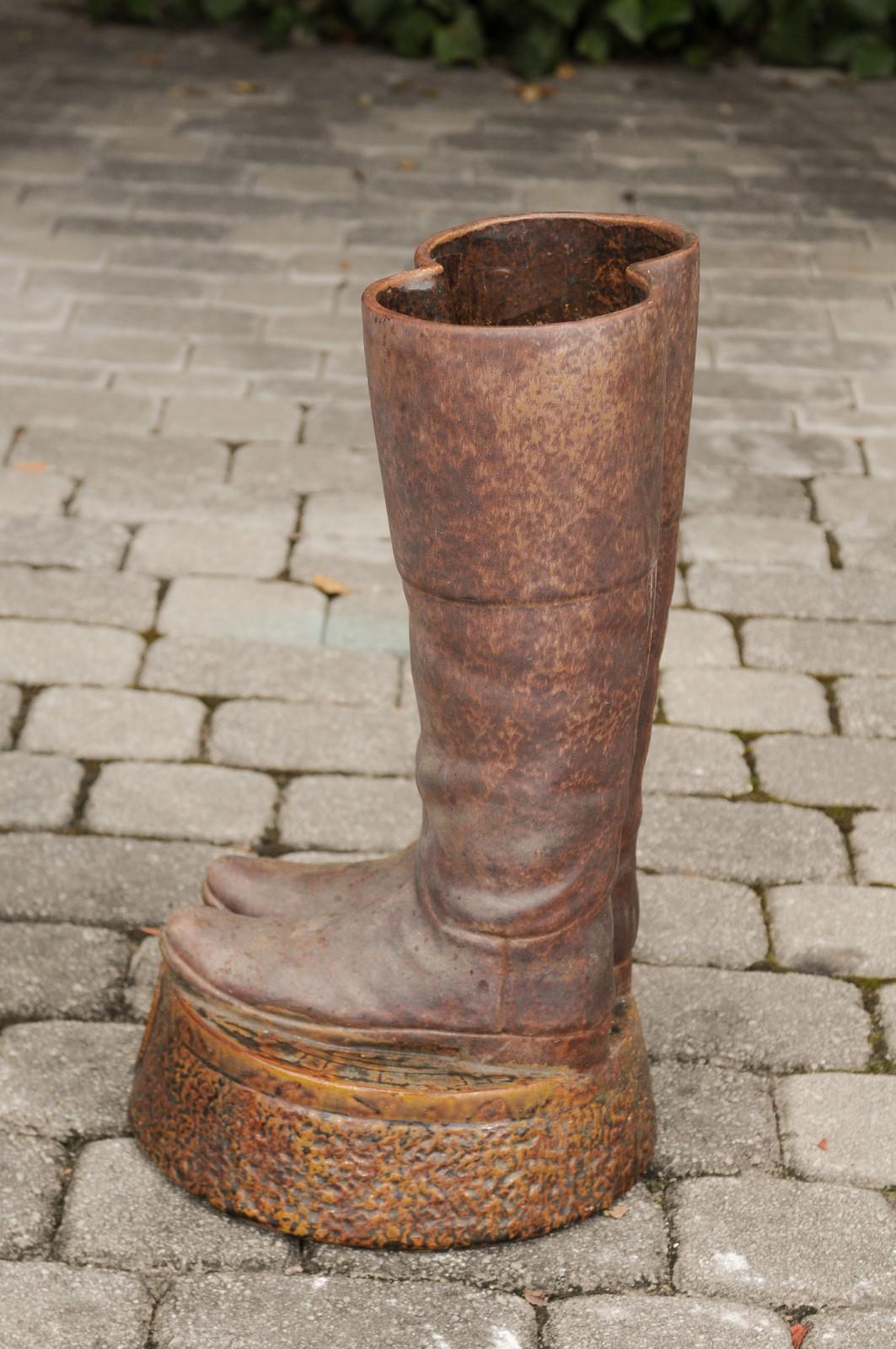 Terracotta Umbrella Stand Depicting a Pair of Brown Riding Boots on Base 2