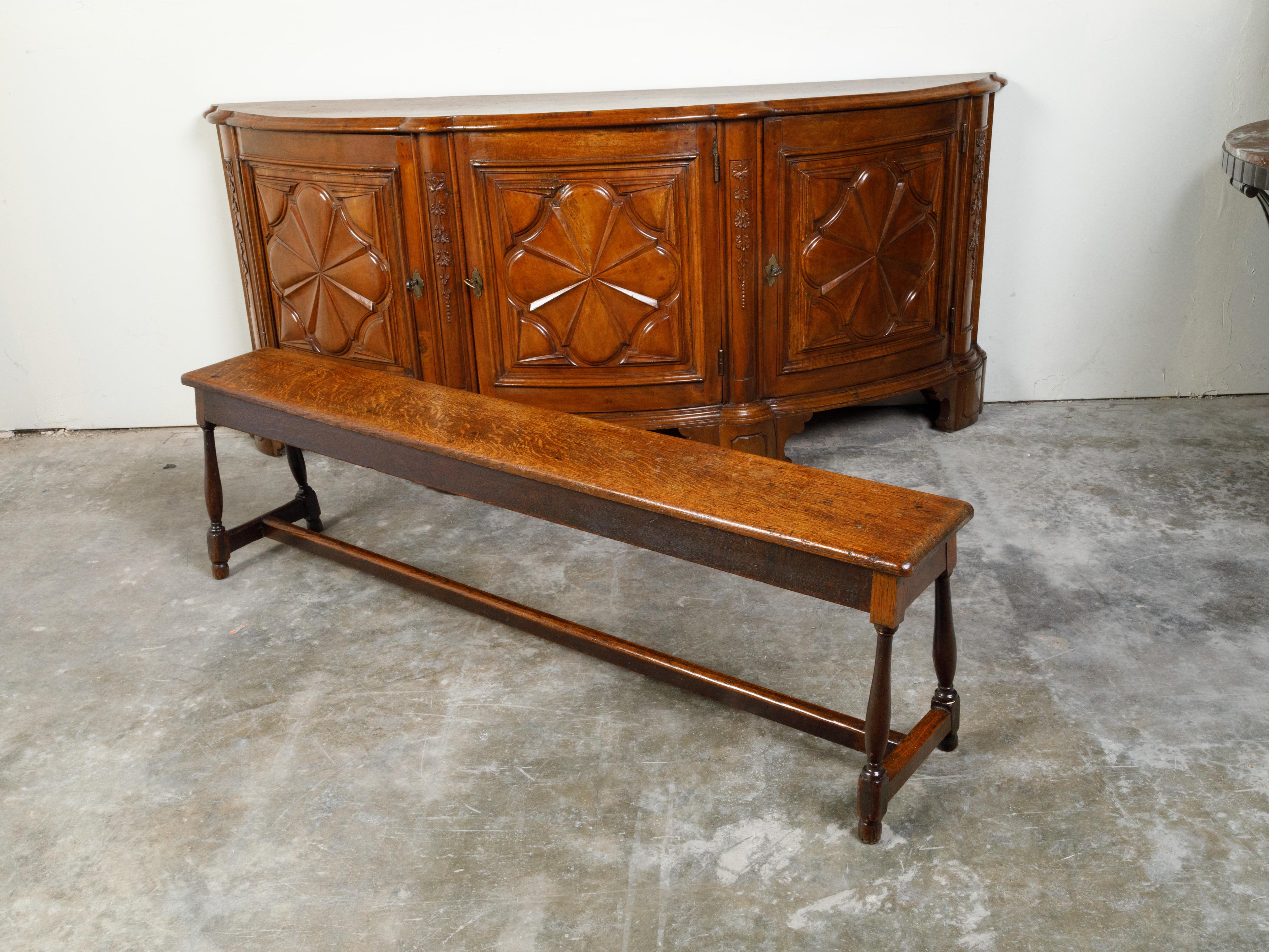 20th Century English 1900s Turn of the Century Oak Bench with Splaying Column-Shaped Legs