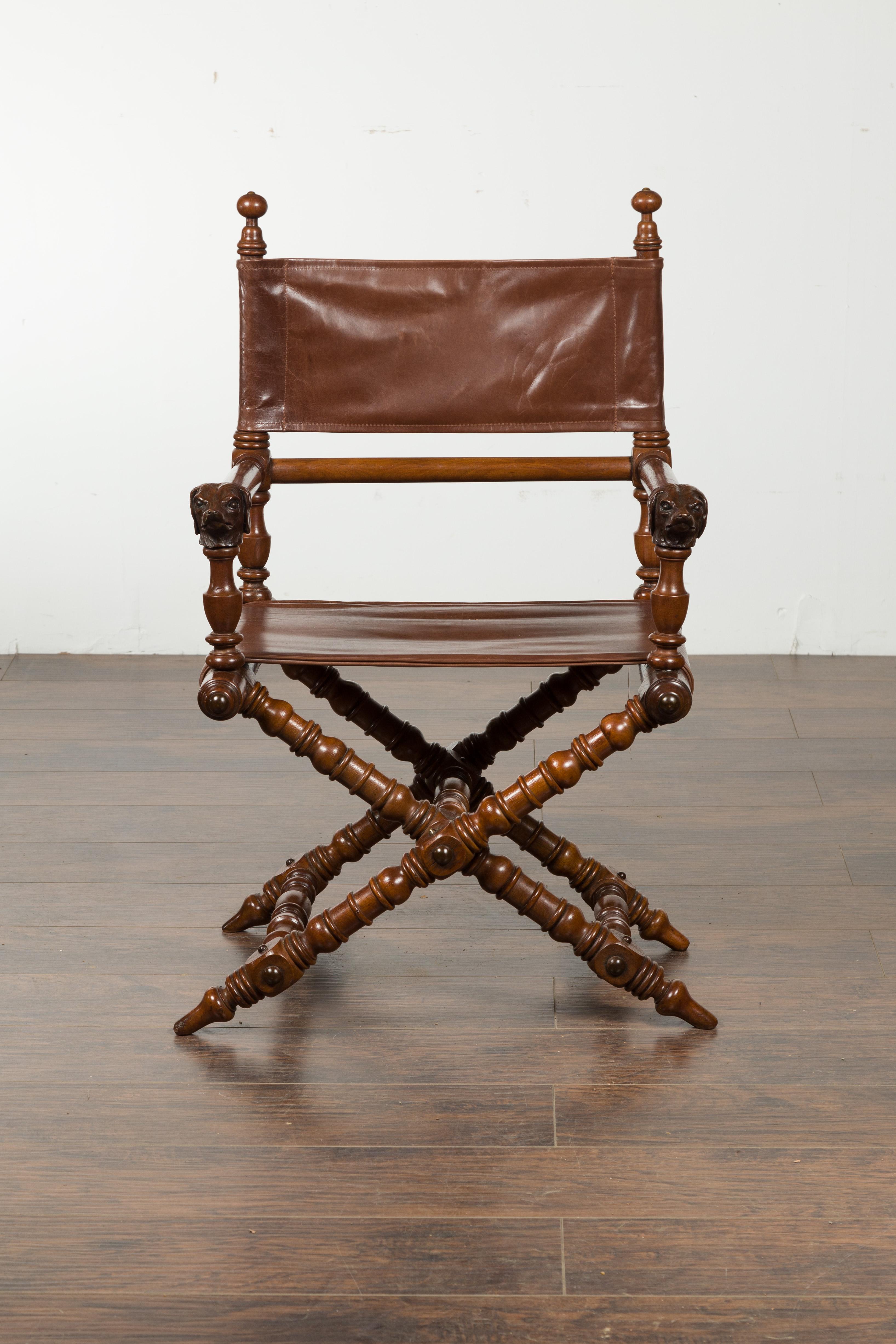 20th Century English 1900s Walnut Chair with Carved Dog Heads, Leather Seat and Turned Base For Sale