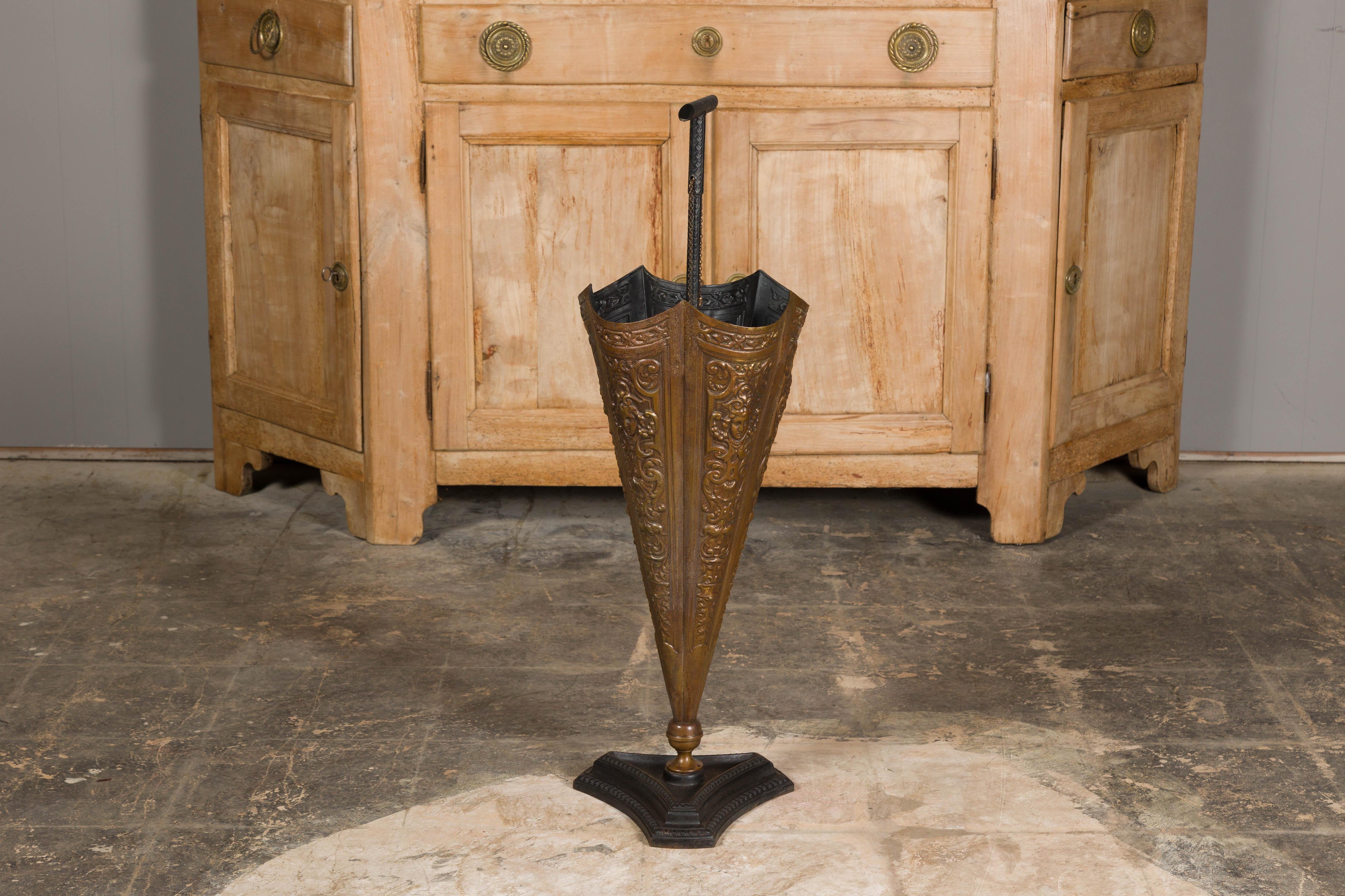 English 1920-1930 Brass Umbrella Stand with Raised Motifs and Tripartite Base In Good Condition For Sale In Atlanta, GA