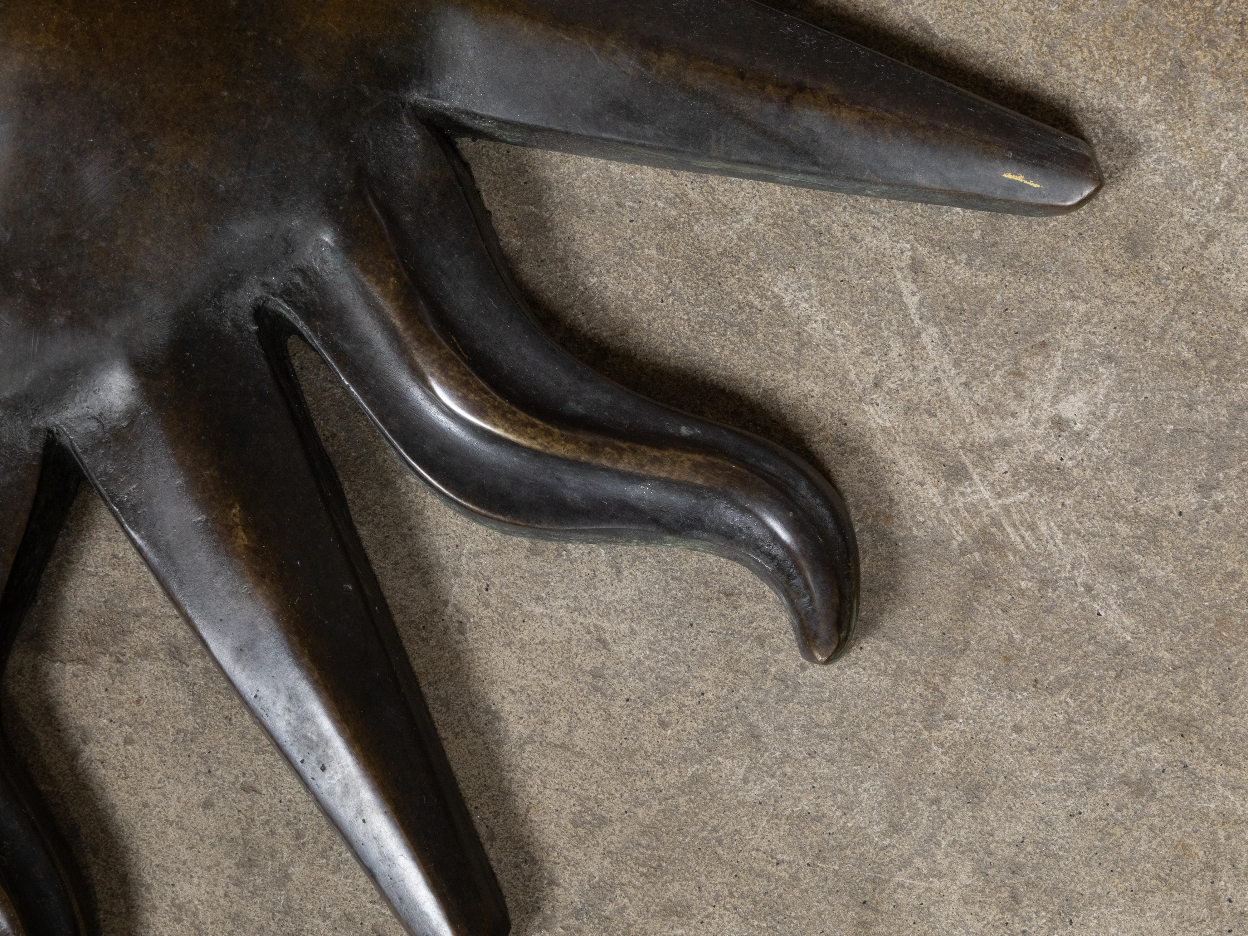 20ième siècle The Ornamental en bronze de 1920 avec des traits anthropomorphes et une patine foncée en vente