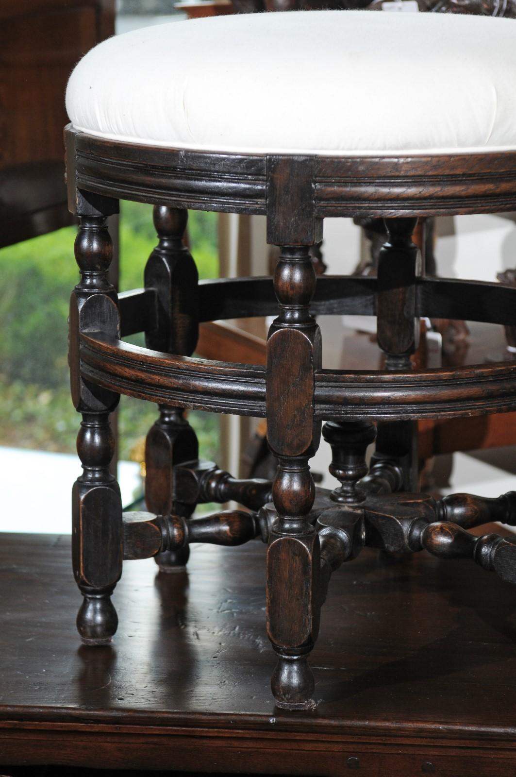 20th Century English, 1920s Round Oak Stool with Turned Legs, Dark Patina and New Upholstery