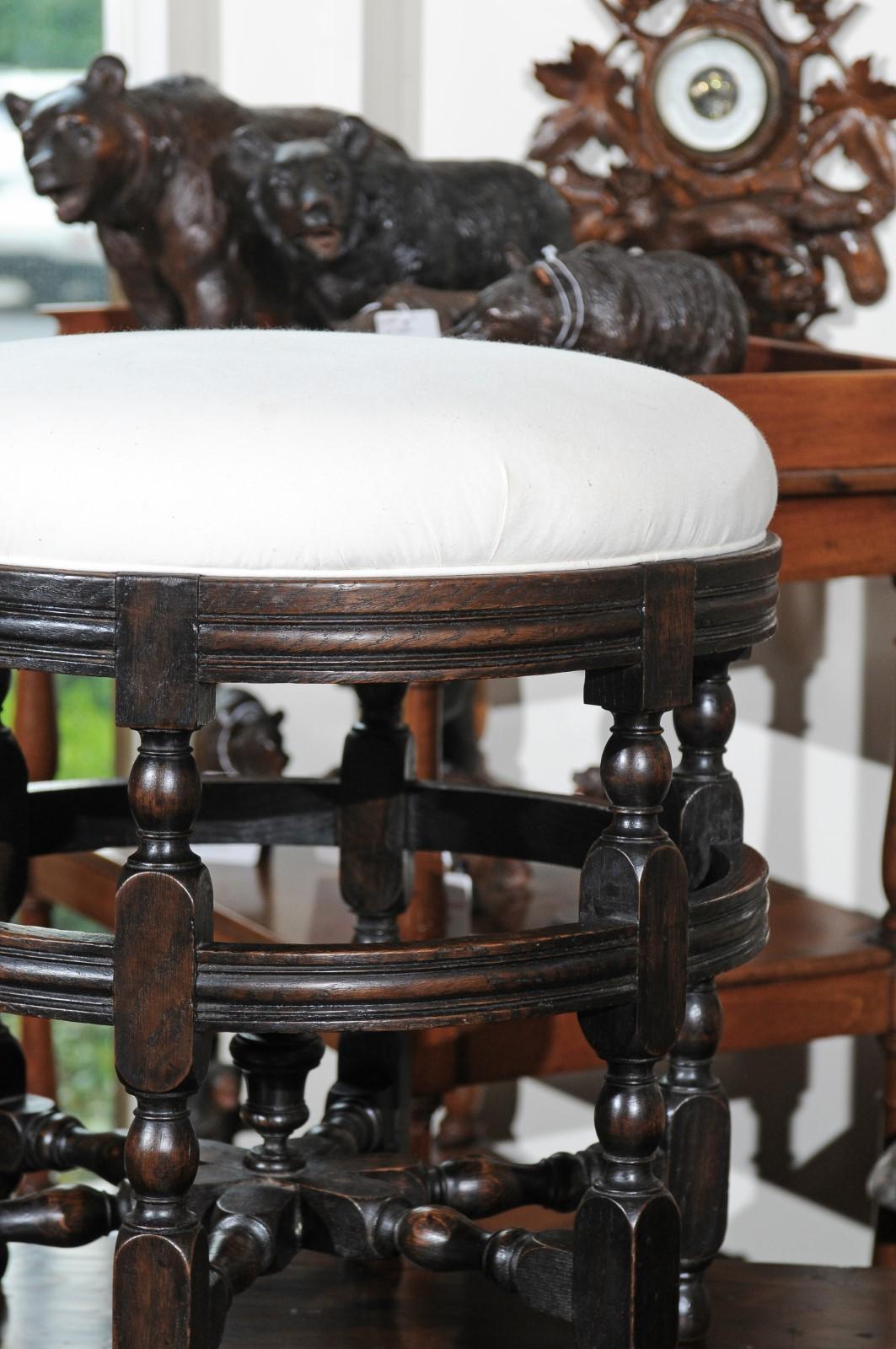 English, 1920s Round Oak Stool with Turned Legs, Dark Patina and New Upholstery 3