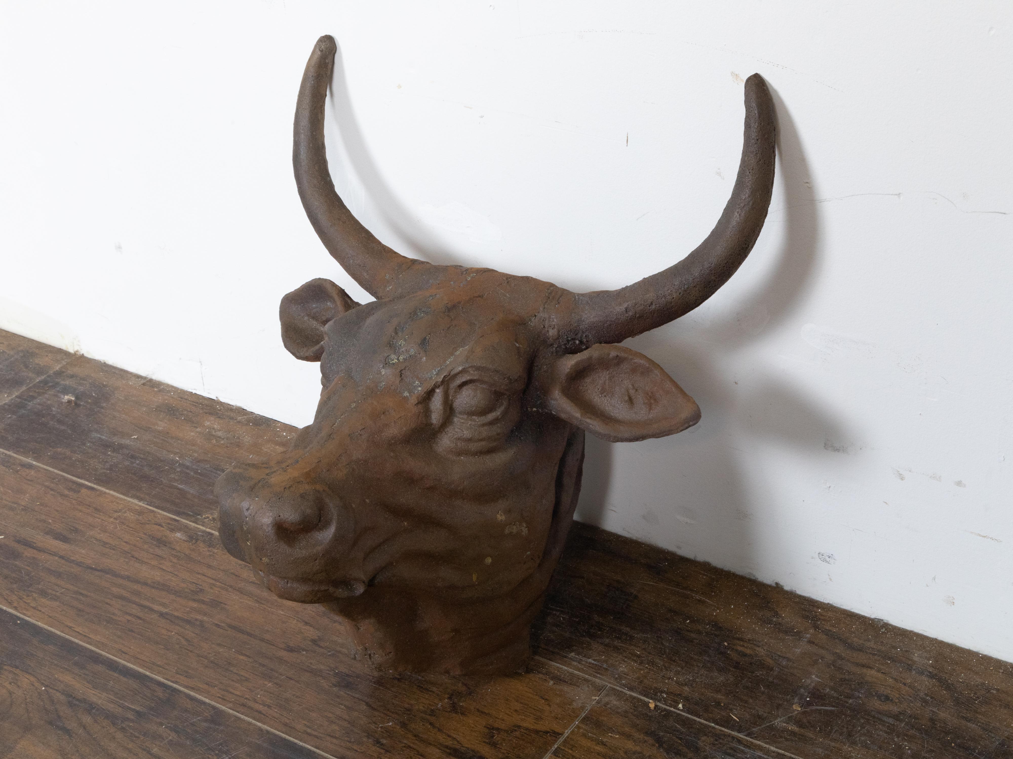 English 1930s-1940s Cast Iron Bull Wall Hanging Sculpture with Rusty Patina In Good Condition For Sale In Atlanta, GA