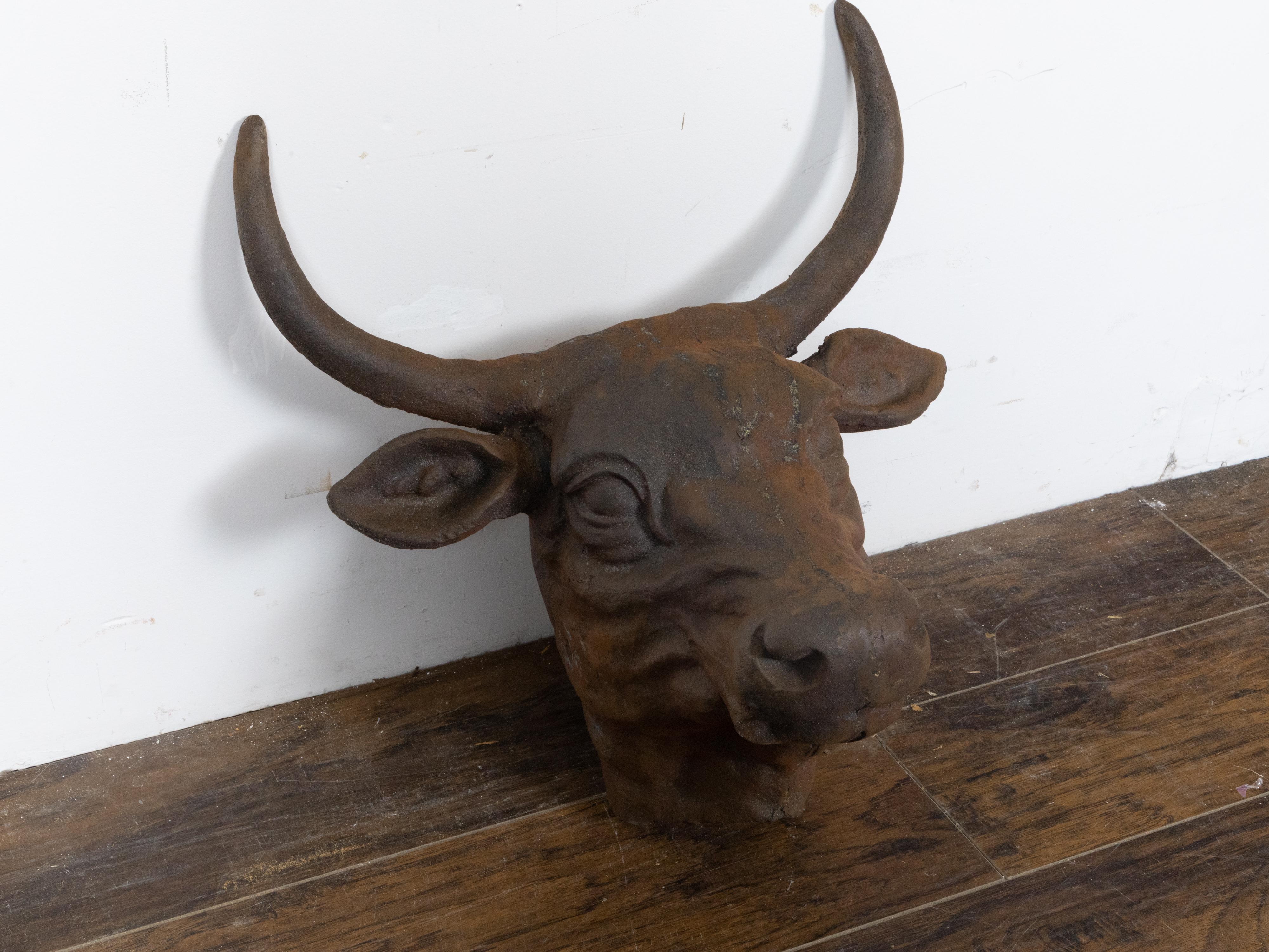 English 1930s-1940s Cast Iron Bull Wall Hanging Sculpture with Rusty Patina In Good Condition For Sale In Atlanta, GA