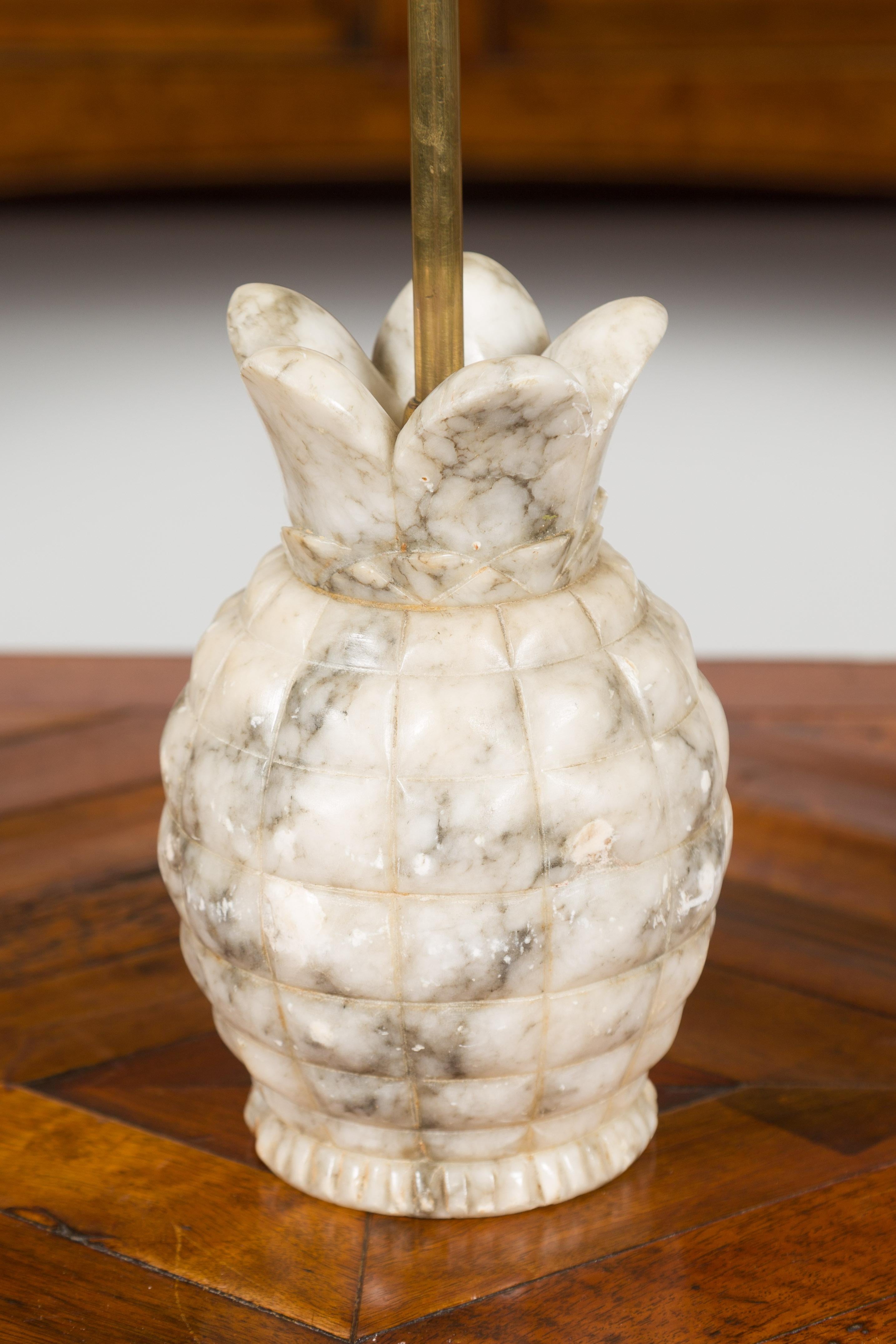 English 1930s Marble and Brass Doorstop with Carved Pineapple Base 1