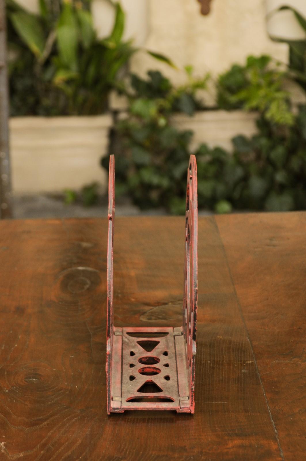 English 1930s Red Painted Metal Magazine Rack with Medallions and Greyhounds For Sale 4