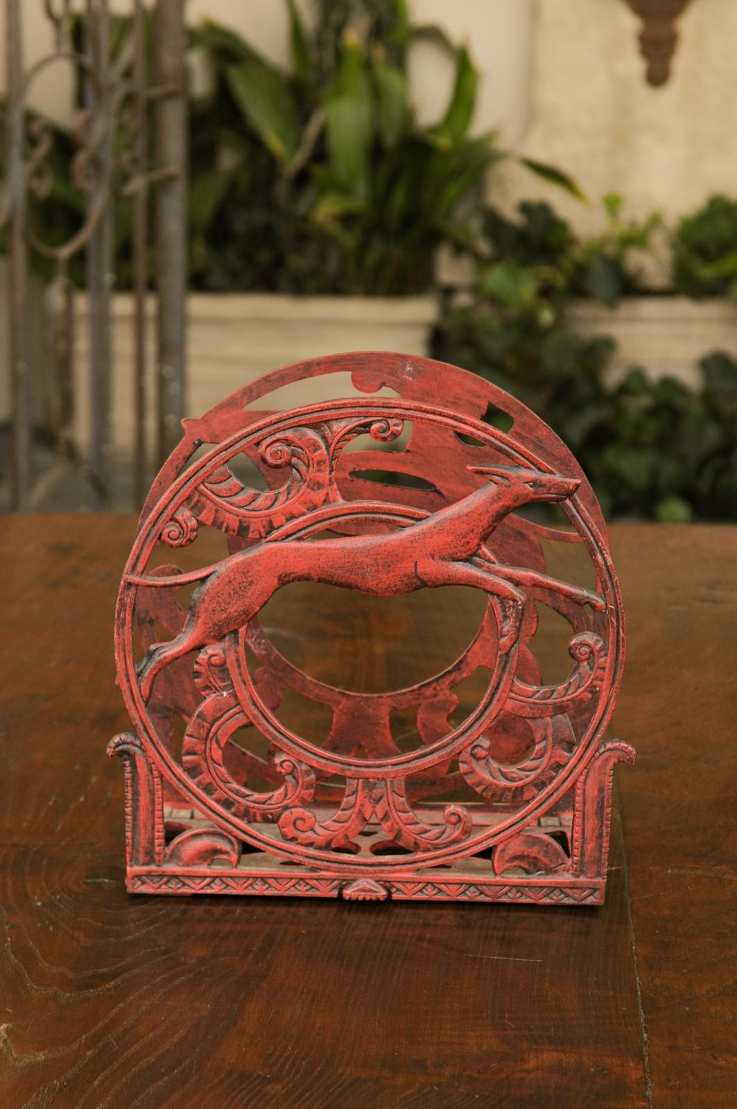English 1930s Red Painted Metal Magazine Rack with Medallions and Greyhounds In Good Condition For Sale In Atlanta, GA
