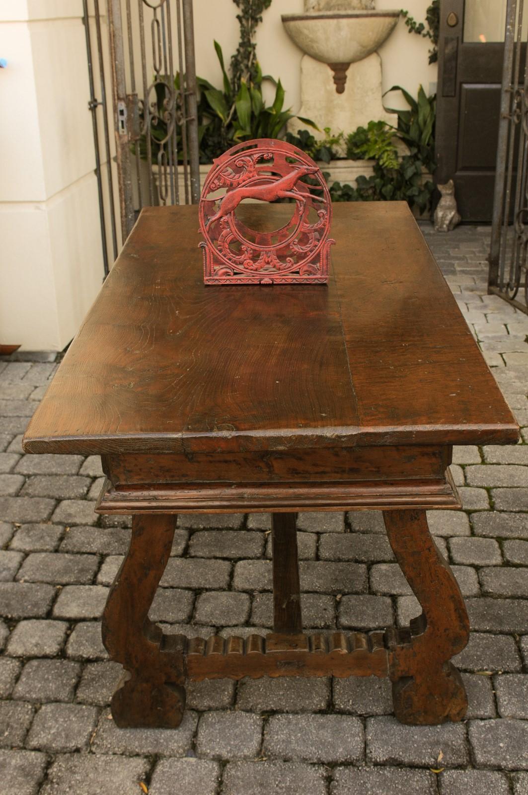 20th Century English 1930s Red Painted Metal Magazine Rack with Medallions and Greyhounds For Sale