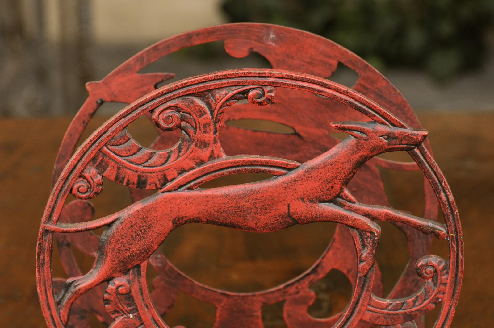 English 1930s Red Painted Metal Magazine Rack with Medallions and Greyhounds For Sale 2