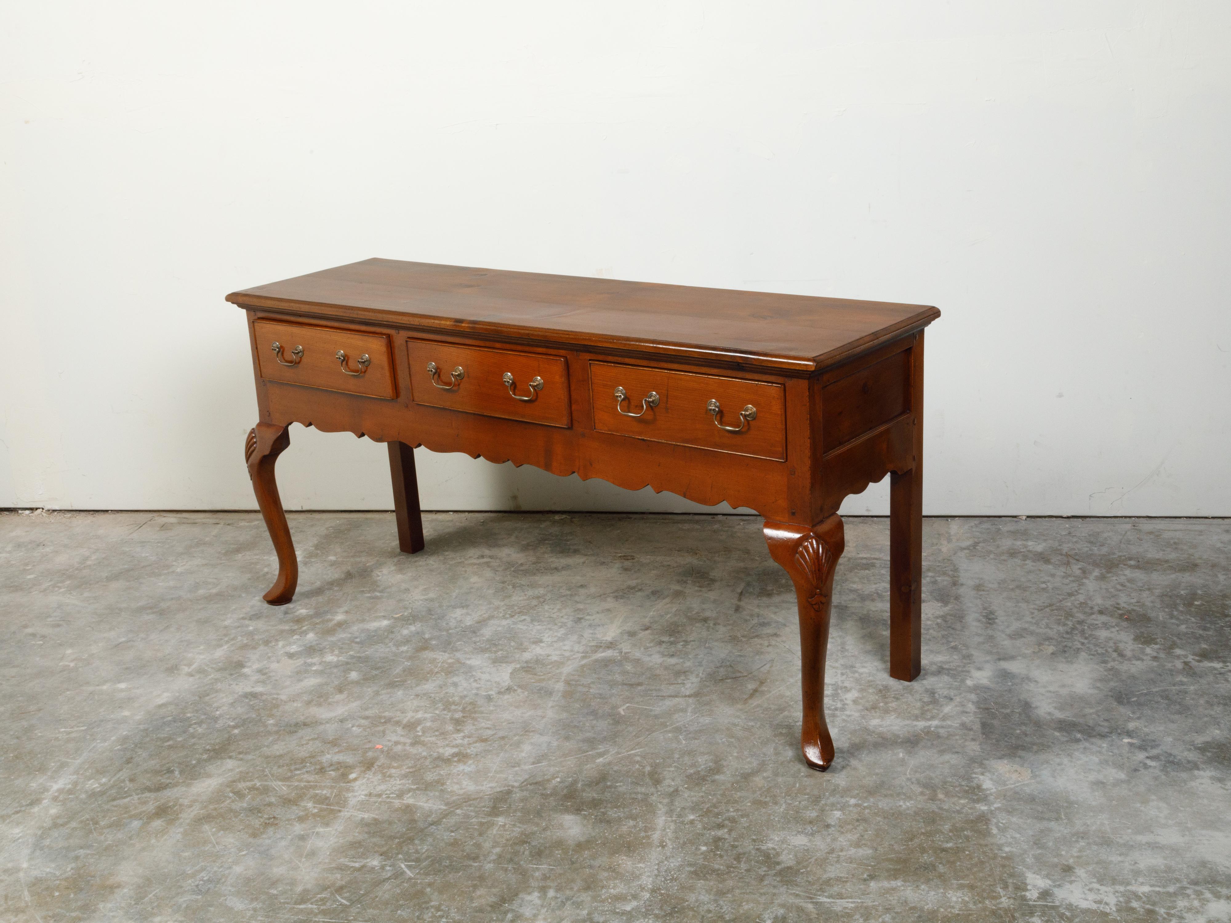 20th Century English 1940s Dresser Base with Three Drawers, Cabriole Legs and Carved Apron For Sale