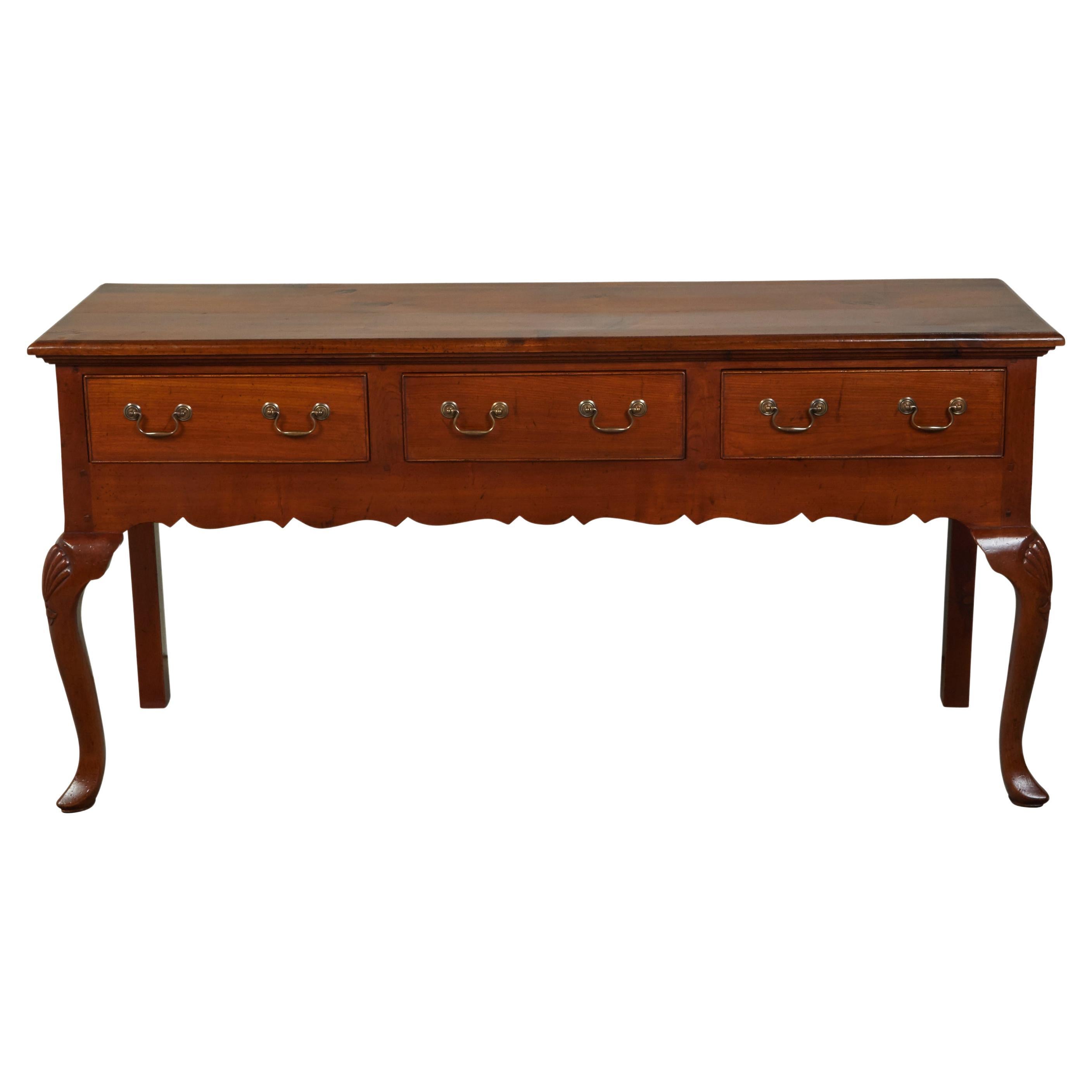 English 1940s Dresser Base with Three Drawers, Cabriole Legs and Carved Apron For Sale