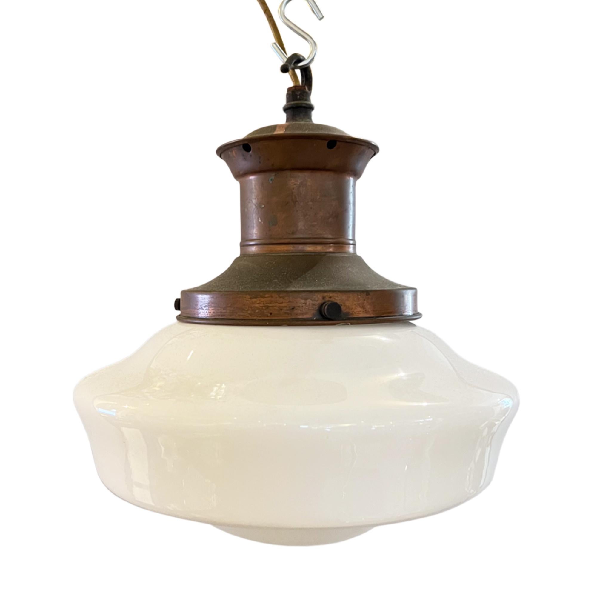 We have several of these classic English pendant lights please take a look at our website or get in touch for more information. 

There are 3 of this particular style and we also have a similar one in a slightly bigger size. 

Made using a simple