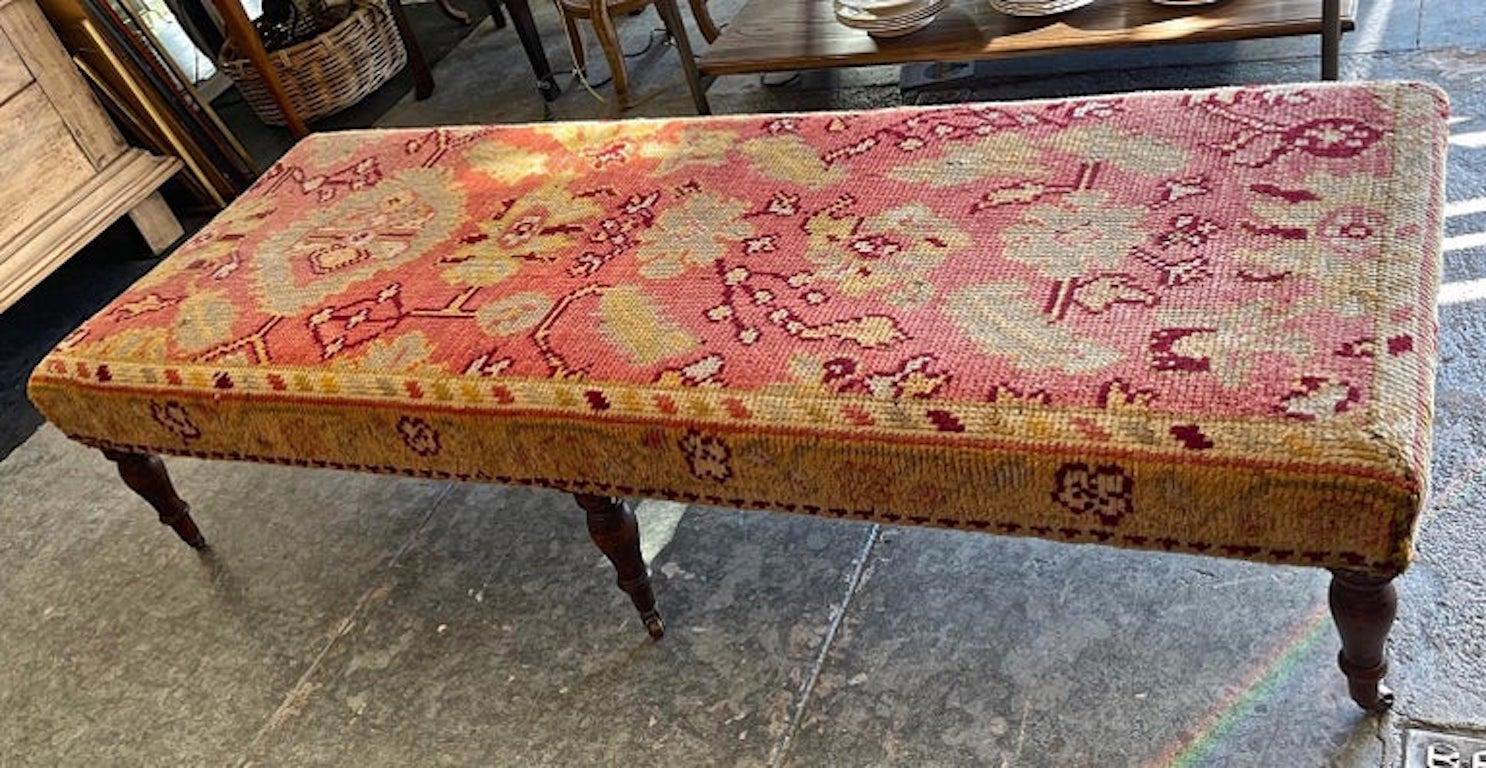 English 1960s Needlepoint Bench on 6 Walnut Legs with Castors In Distressed Condition In Santa Monica, CA