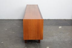 English 1960s Teak and Afromosia Trimmed Sideboard with Cane Doors