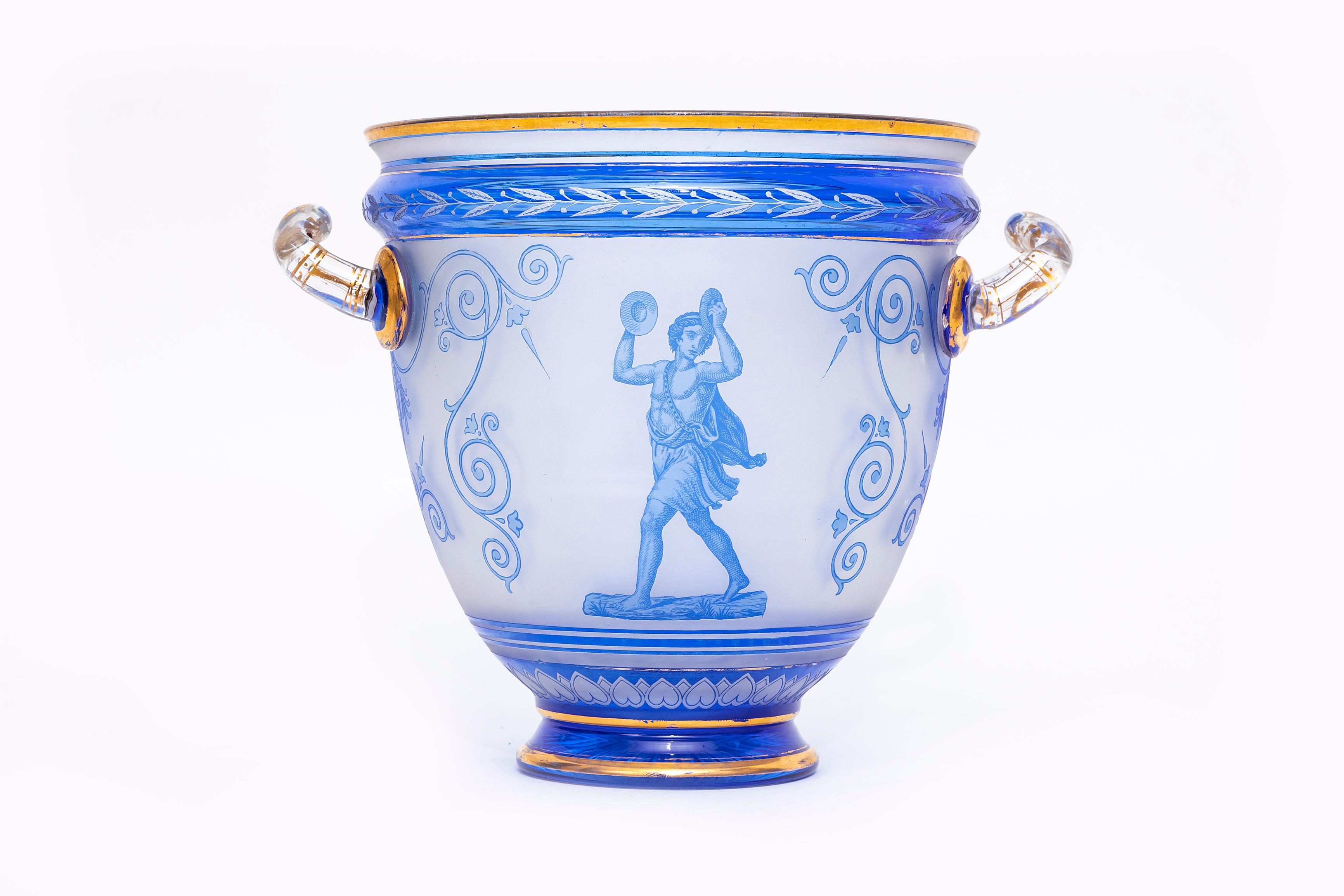A Rare and Highly Important Antique English 19th Century Thomas Webb & Sons Blue Cut-to-Clear Double Handle Cameo Wine Cooler, Signed G. Woodall.  Etched and Ccid Washed.  This 19th century wine cooler’s charm is held within its neoclassical imagery