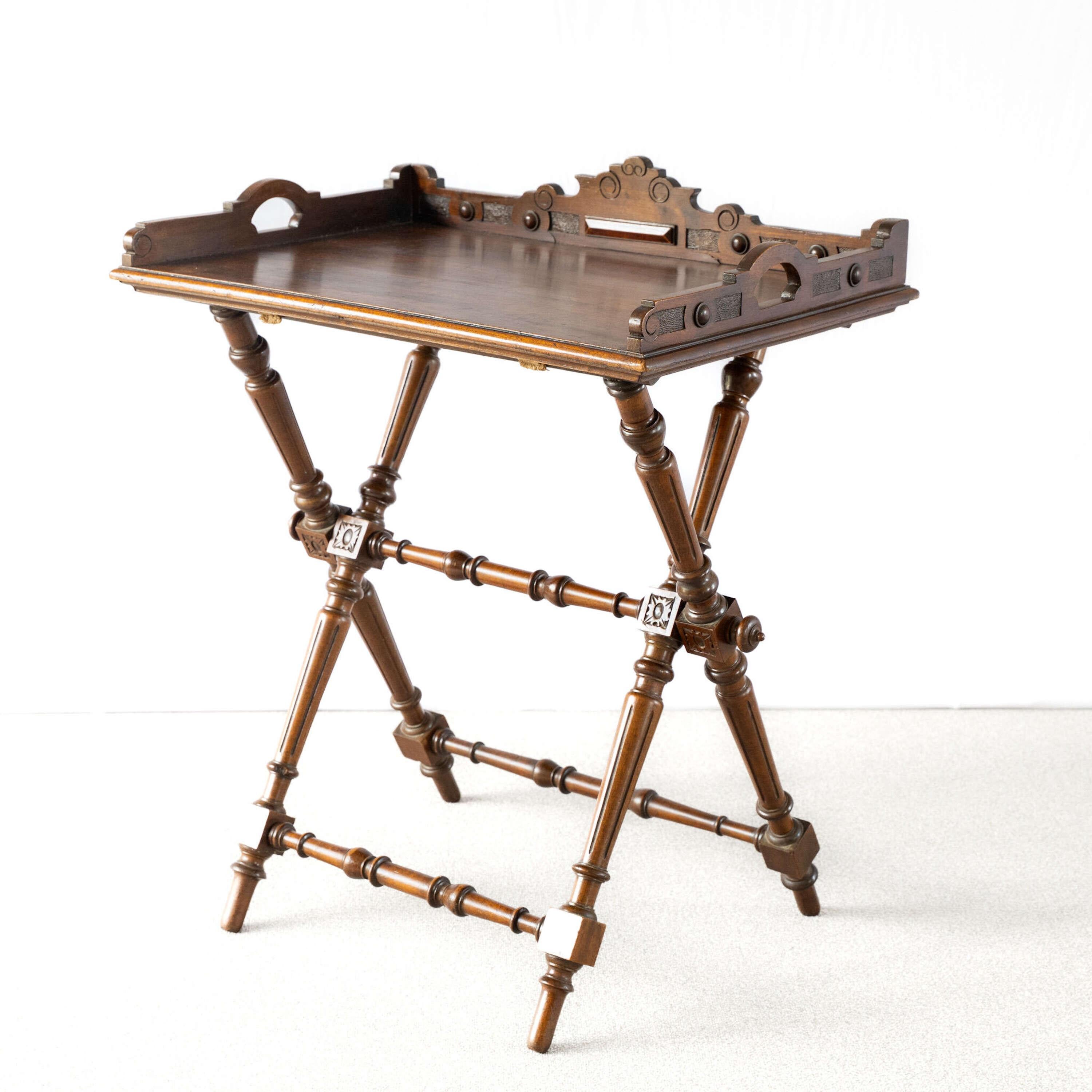 Carved Aesthetic Movement Butler's Tray.
Removable tray sits on foldable legs.

England, circa 1890.

Height - 86.5 cm
Width - 73.5 cm
Depth - 49 cm
Please message if any further info or photos are required 
SHIPPING
The quotes shown are automated