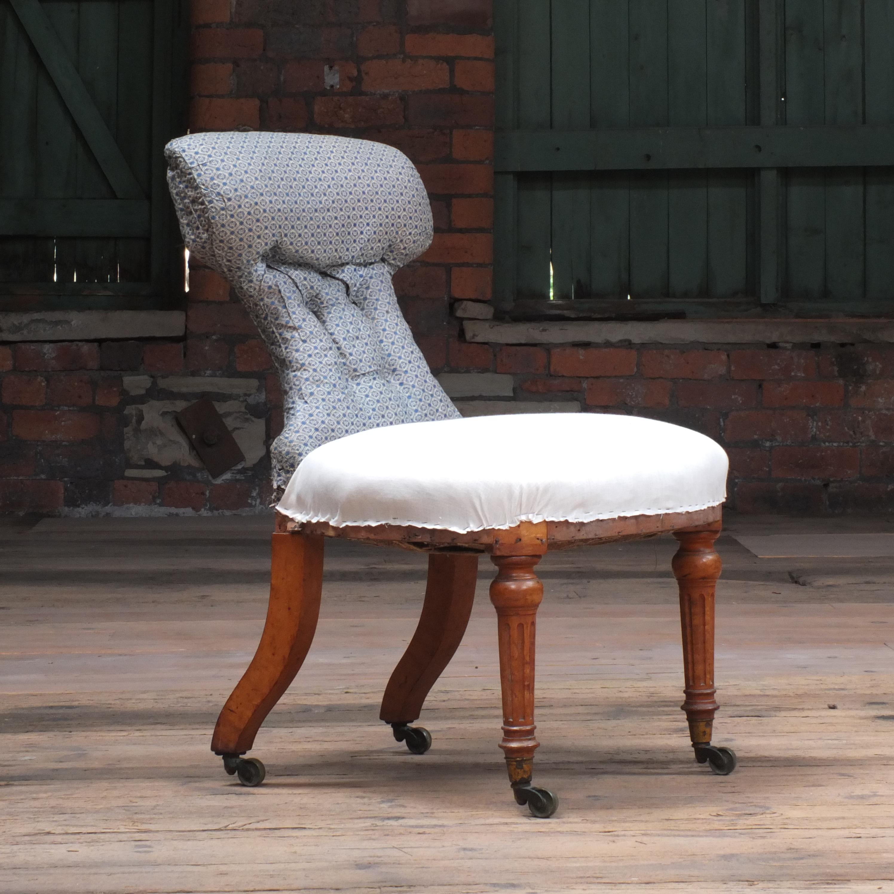A really good quality 19th century occasional chair, unusually raised on Birdseye maple legs both front and back all with original brass castors. perfect size for use as a desk chair.



In need of full upholstery which we can do for you.
 