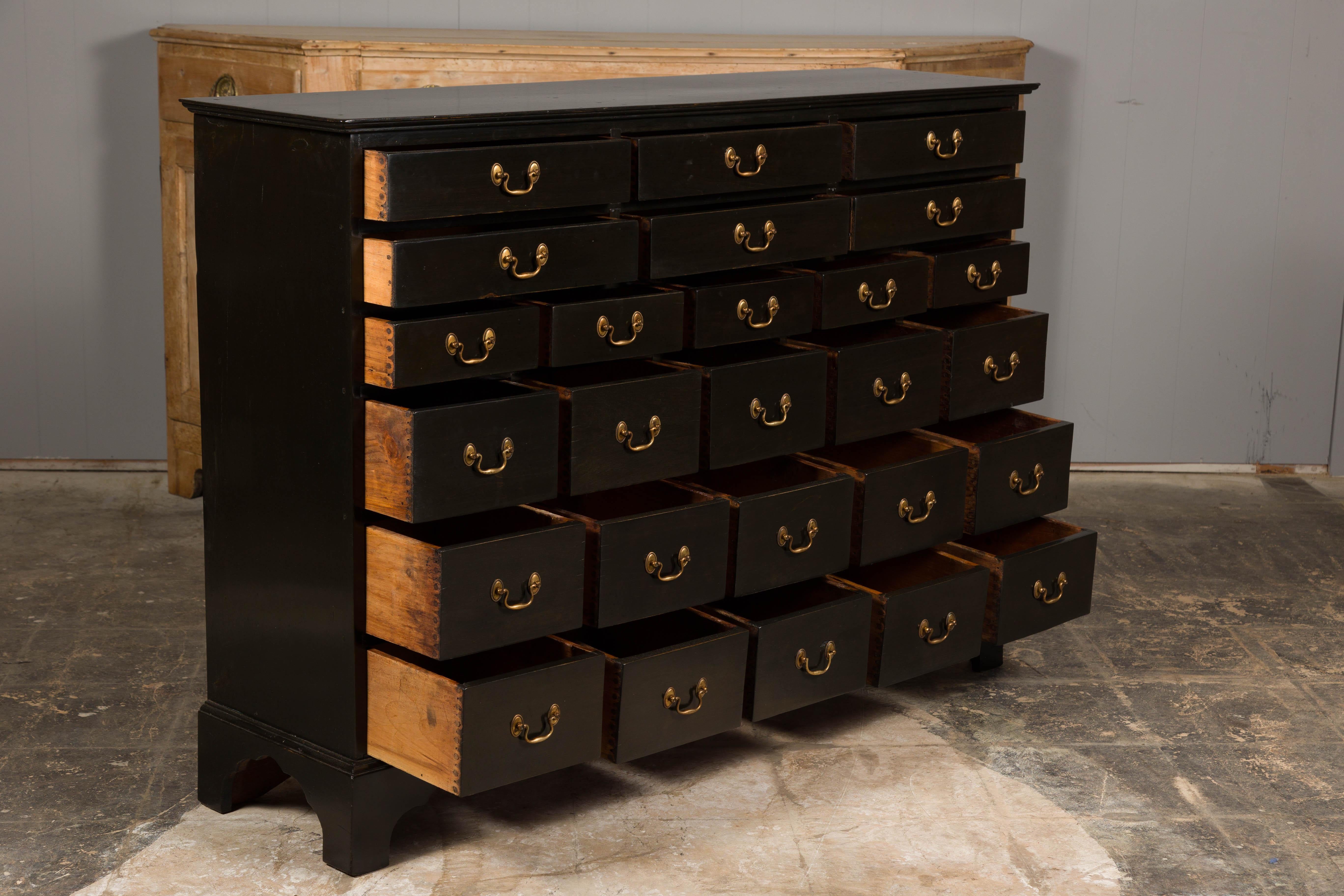 English 19th Century Black Apothecary Chest with 26 Drawers and Brass Hardware For Sale 8