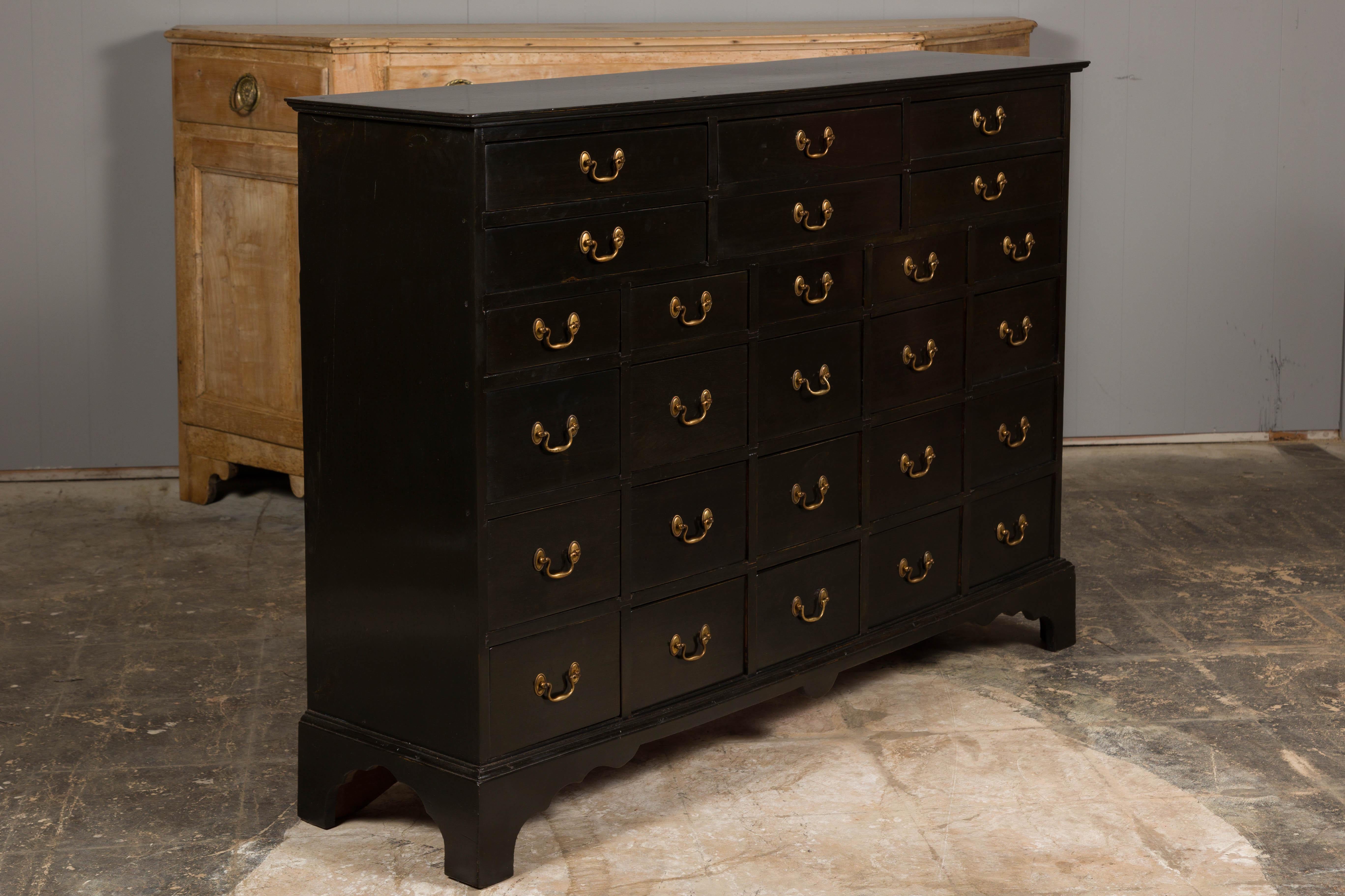 English 19th Century Black Apothecary Chest with 26 Drawers and Brass Hardware For Sale 11