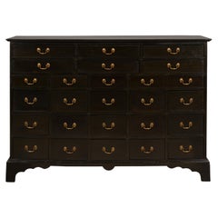 Used English 19th Century Black Apothecary Chest with 26 Drawers and Brass Hardware