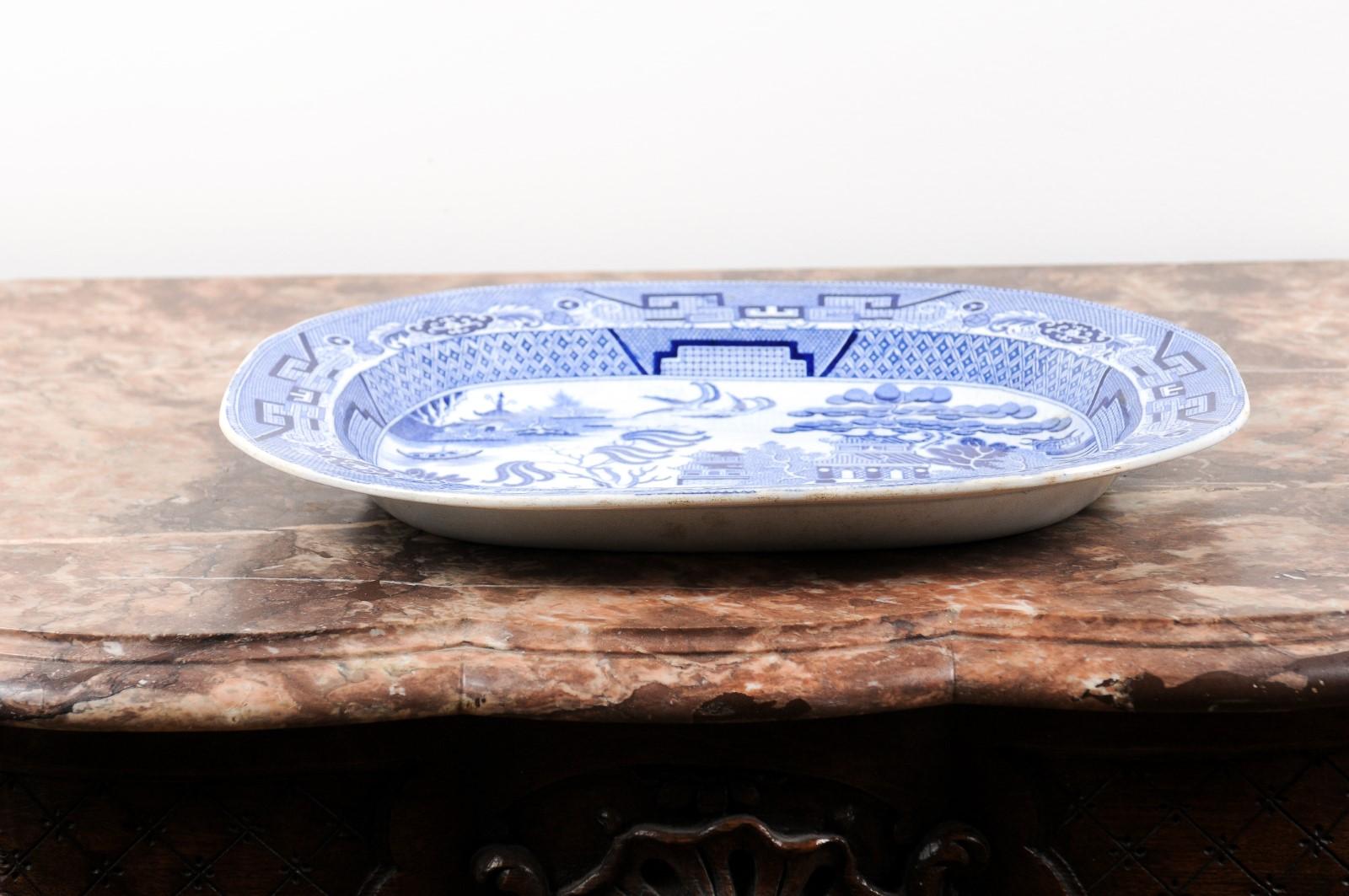 English 19th Century Blue and White Chinoiserie Stoneware Willow Pattern Platter 5